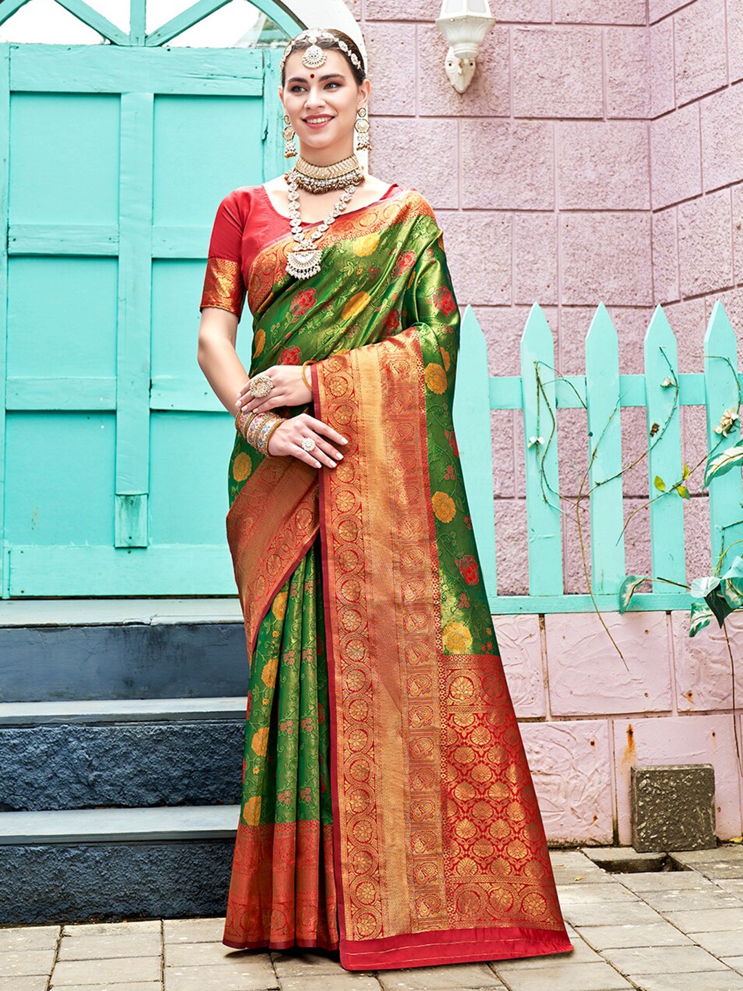 

Anouk Green & Red Floral Woven Design Zari Art Silk Kanjeevaram Saree