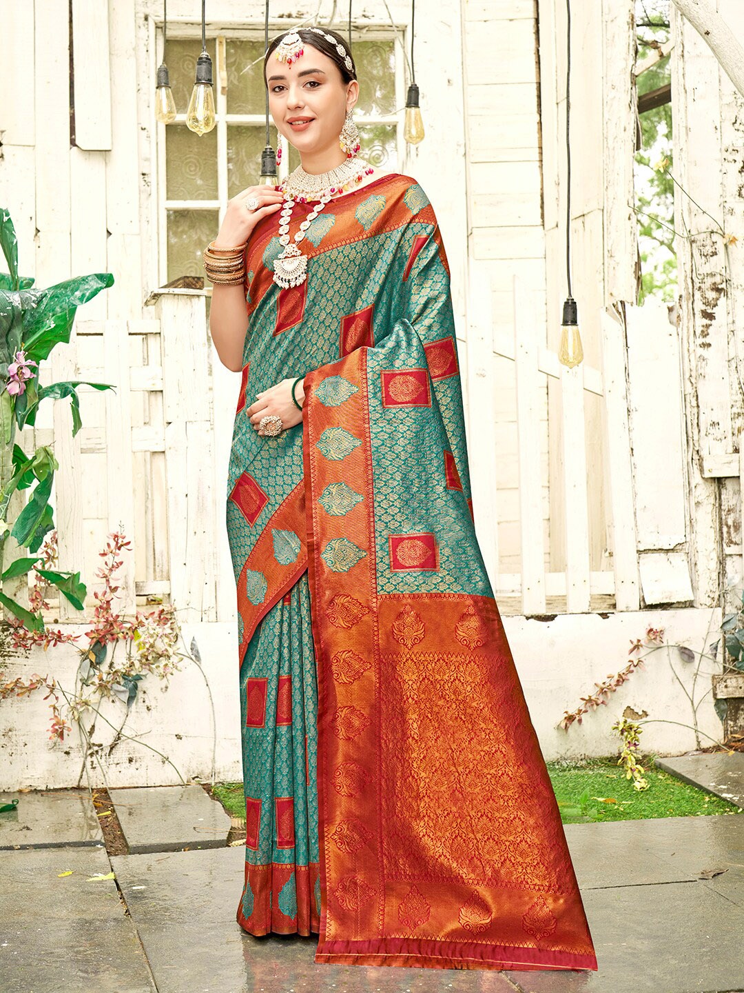 

Anouk Turquoise Blue Ethnic Motifs Woven Design Zari Art Silk Kanjeevaram Saree