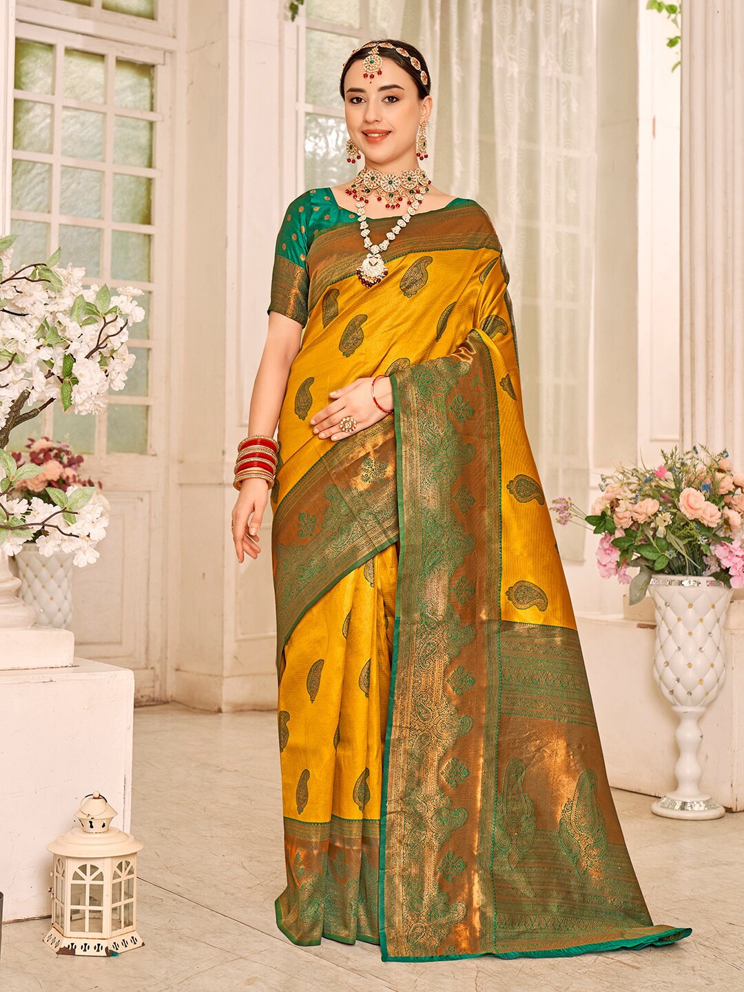 

Anouk Yellow & Green Ethnic Motifs Woven Design Zari Kanjeevaram Saree