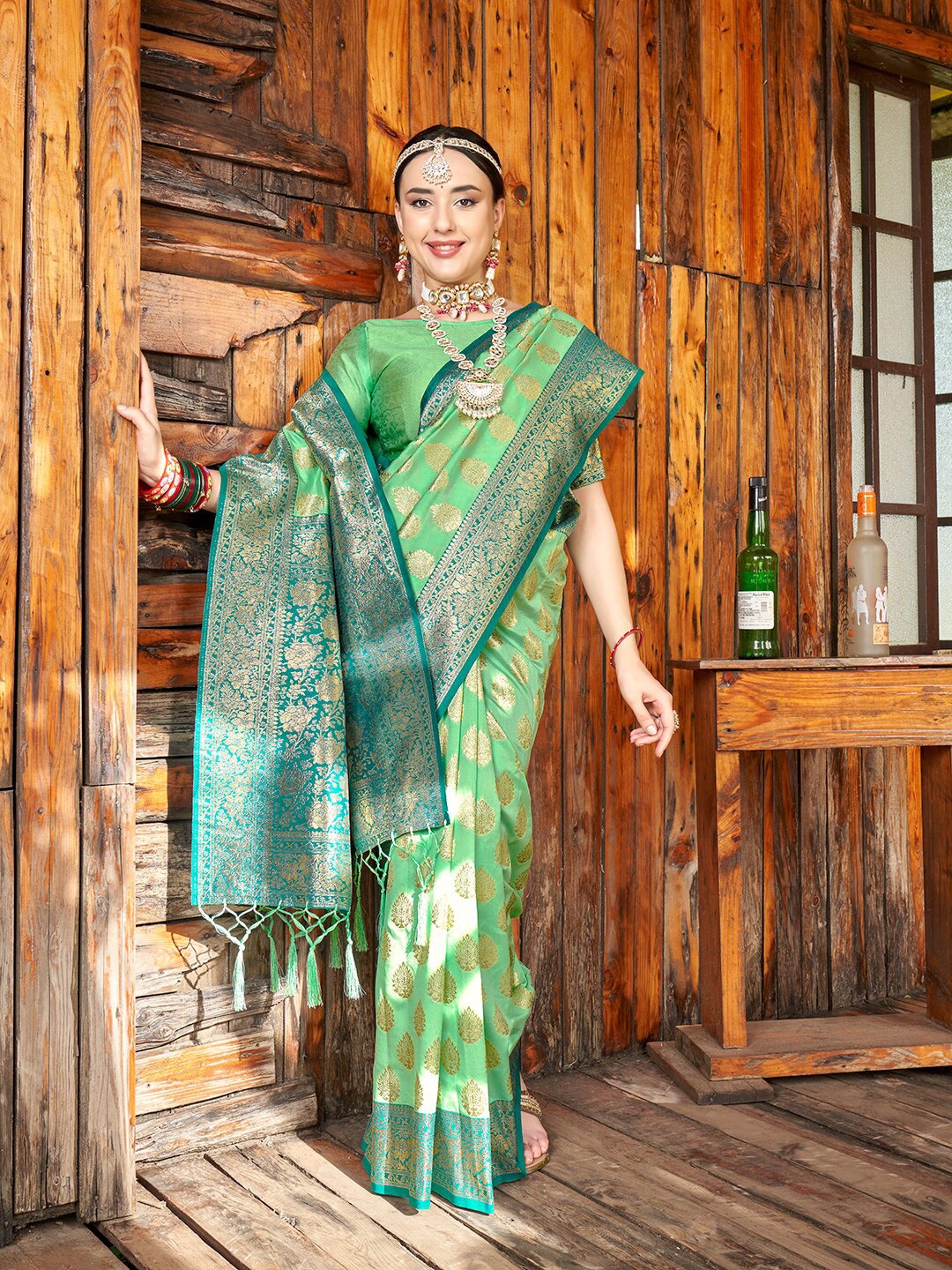 

Anouk Green & Gold-Toned Woven Design Zari Banarasi Saree