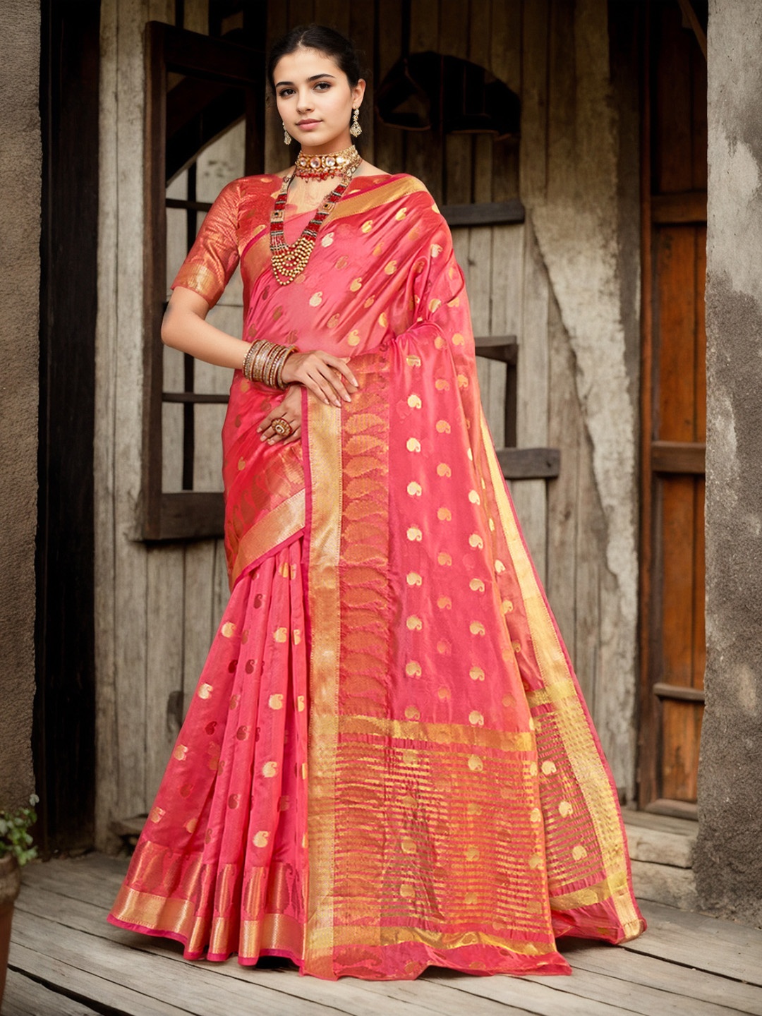 

Anouk Pink & Gold-Toned Ethnic Motifs Woven Design Zari Organza Saree