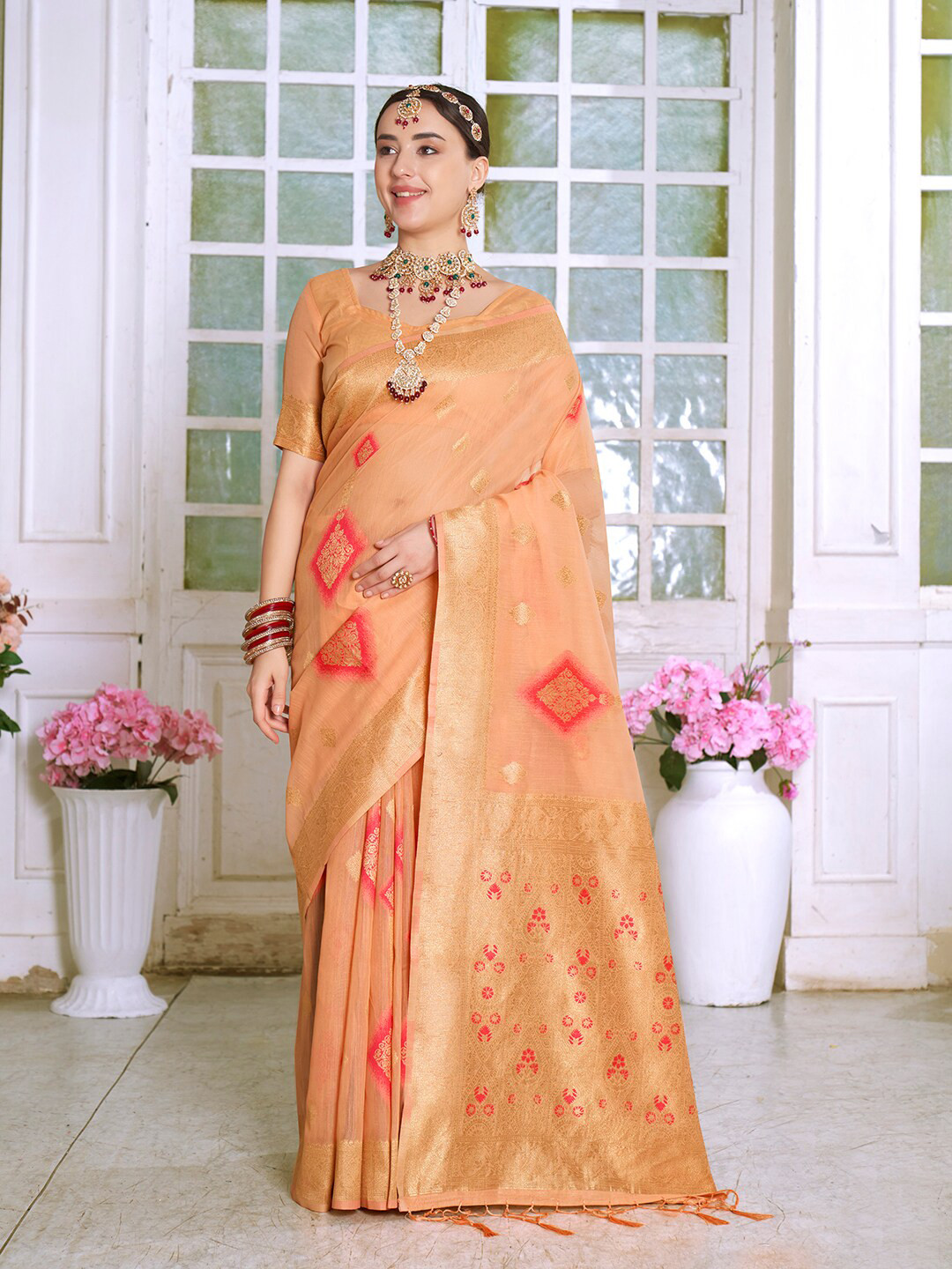 

Anouk Orange Ethnic Motifs Woven Design Zari Art Silk Saree