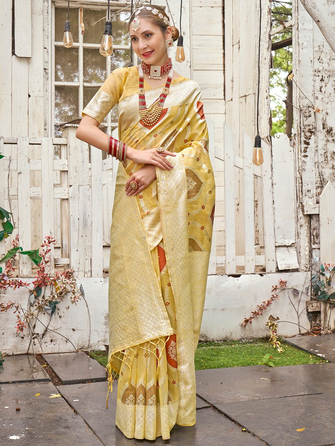 

Anouk Yellow & Red Ethnic Motifs Woven Design Zari Saree