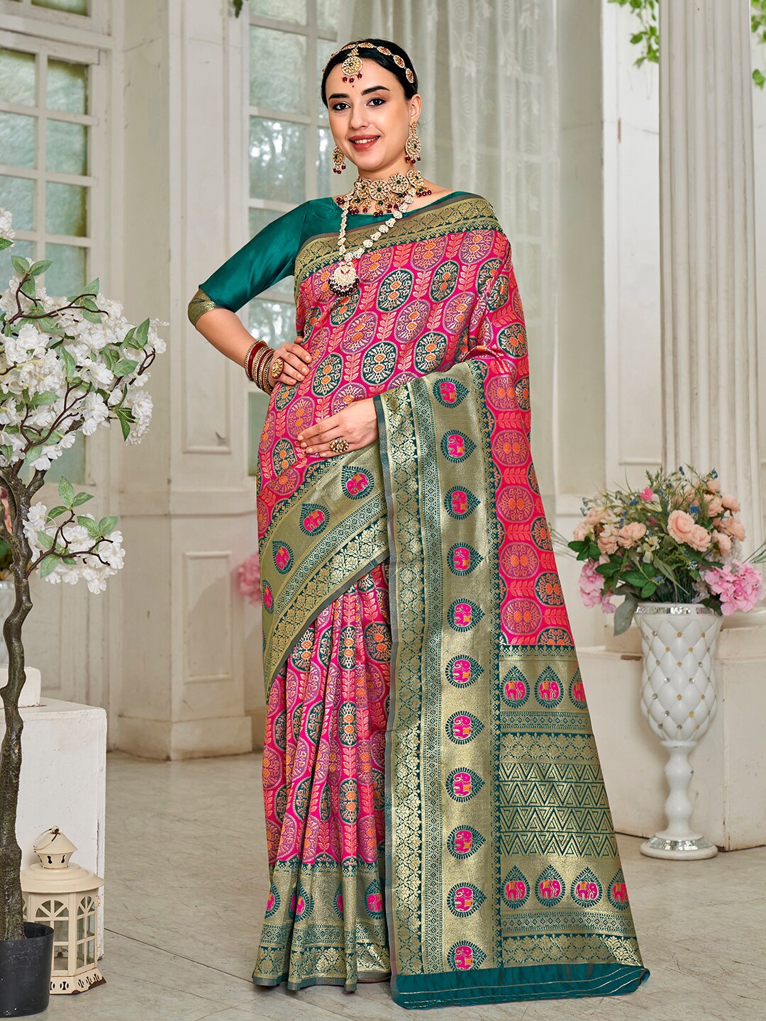 

Anouk Pink & Green Ethnic Motifs Woven Design Zari Kanjeevaram Saree