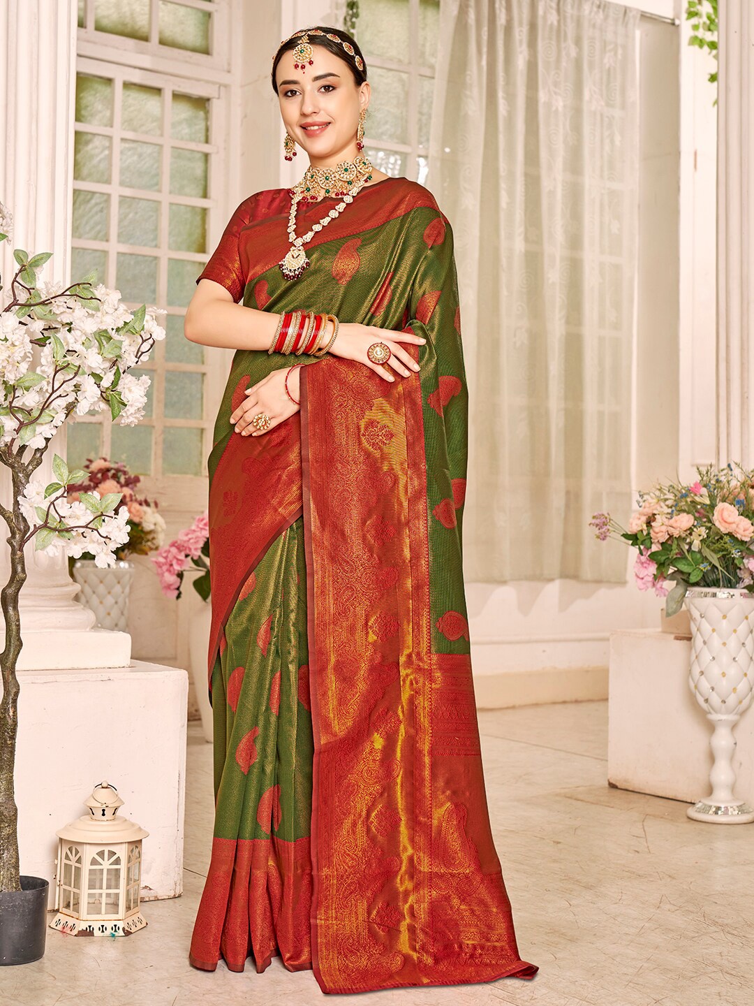 

Anouk Green Ethnic Motifs Woven Design Zari Art Silk Kanjeevaram Saree