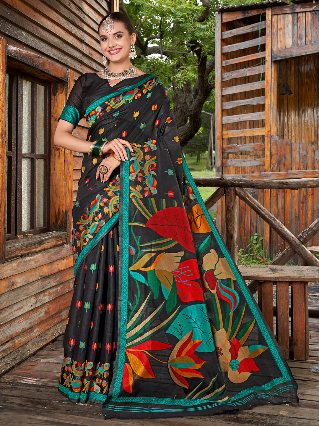 

Anouk Black & Blue Floral Woven Design Organza Saree