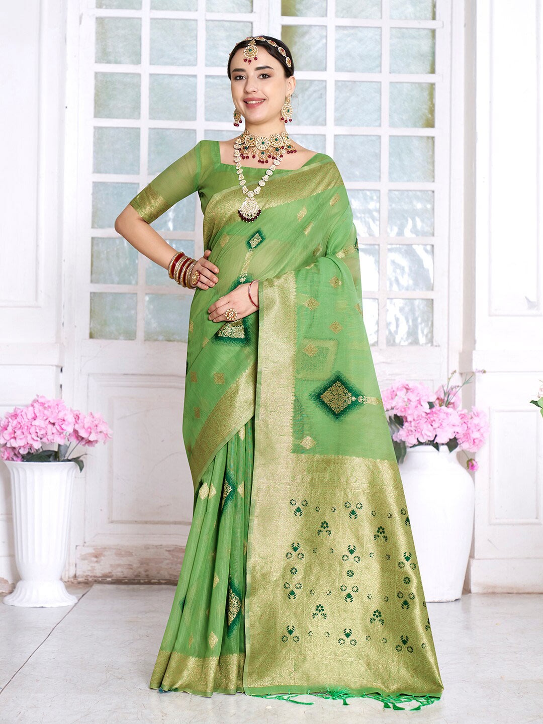 

Anouk Lime Green & Gold-Toned Woven Design Zari Saree