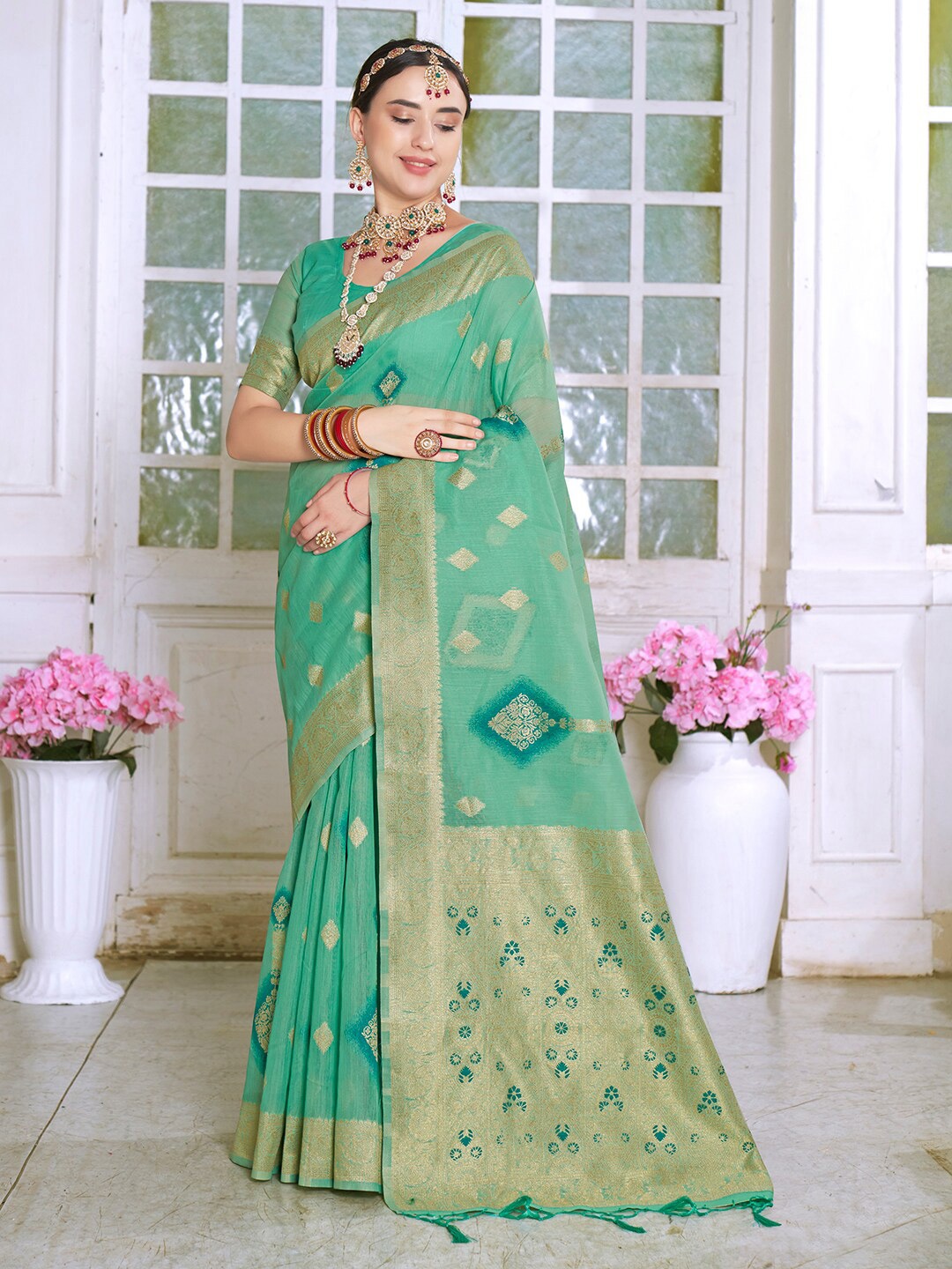 

Anouk Turquoise Blue Ethnic Motifs Woven Design Zari Art Silk Saree