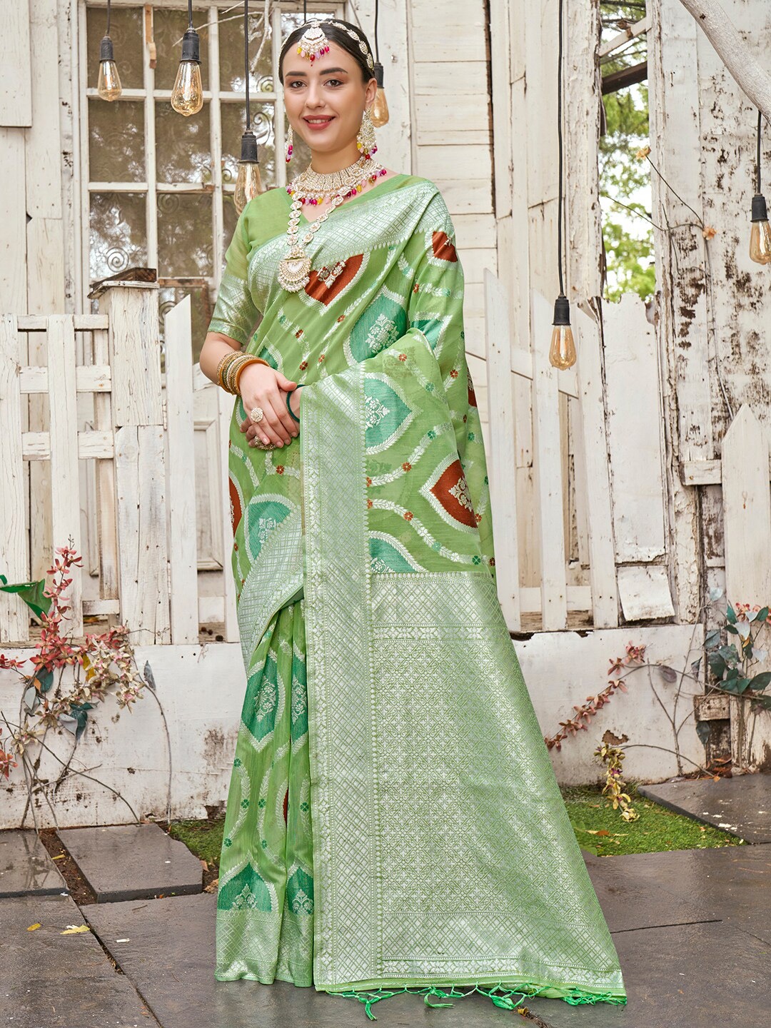 

Anouk Lime Green Ethnic Motifs Woven Design Zari Art Silk Saree