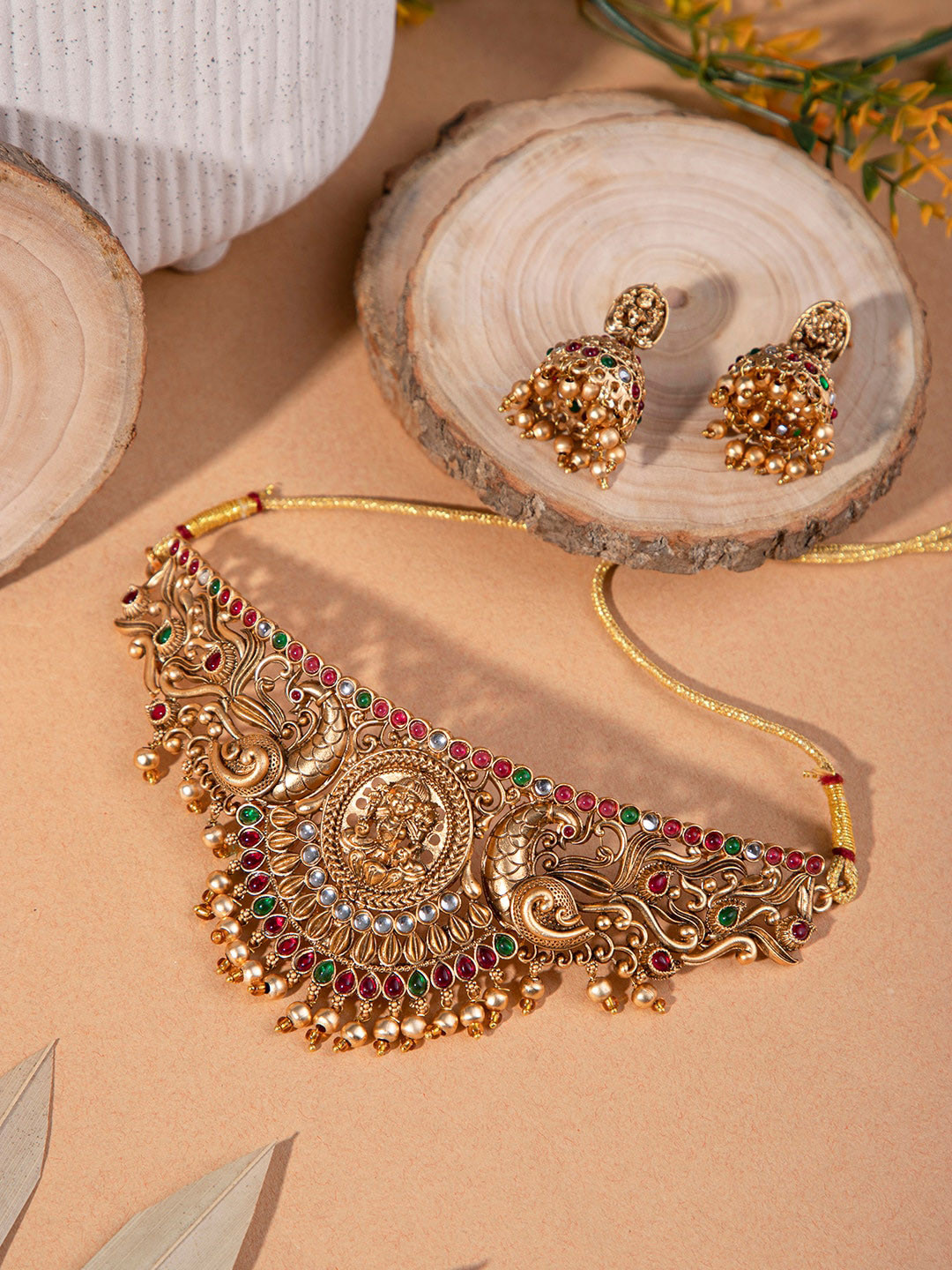 

Priyaasi Gold Plated Stone Studded Kemp Temple Jewellery Set