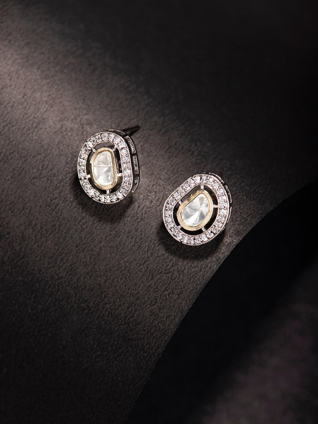 

Priyaasi Silver-Plated Contemporary Studs Earrings