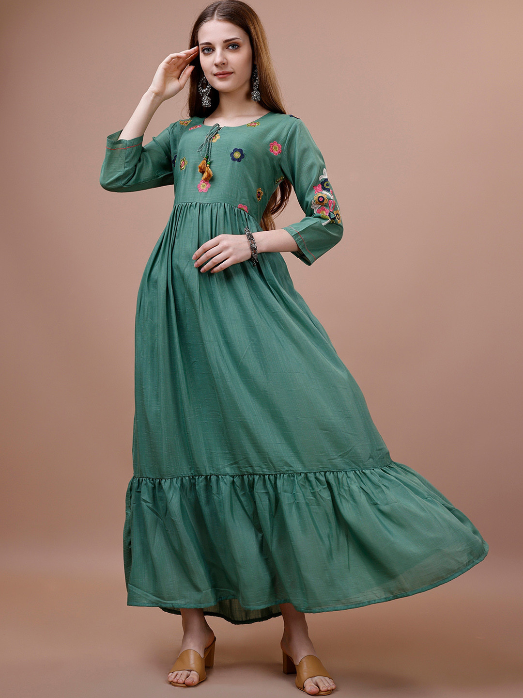 

Ishin Teal Green Embroidered Fit & Flare Maxi Cotton Ethnic Dresses