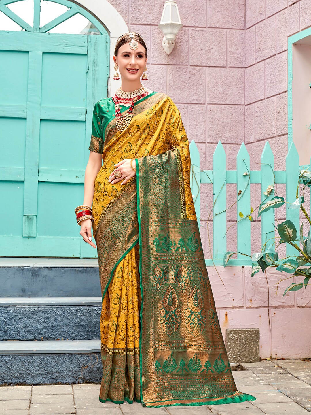 

Anouk Yellow & Green Paisley Woven Design Zari Art Silk Kanjeevaram Saree