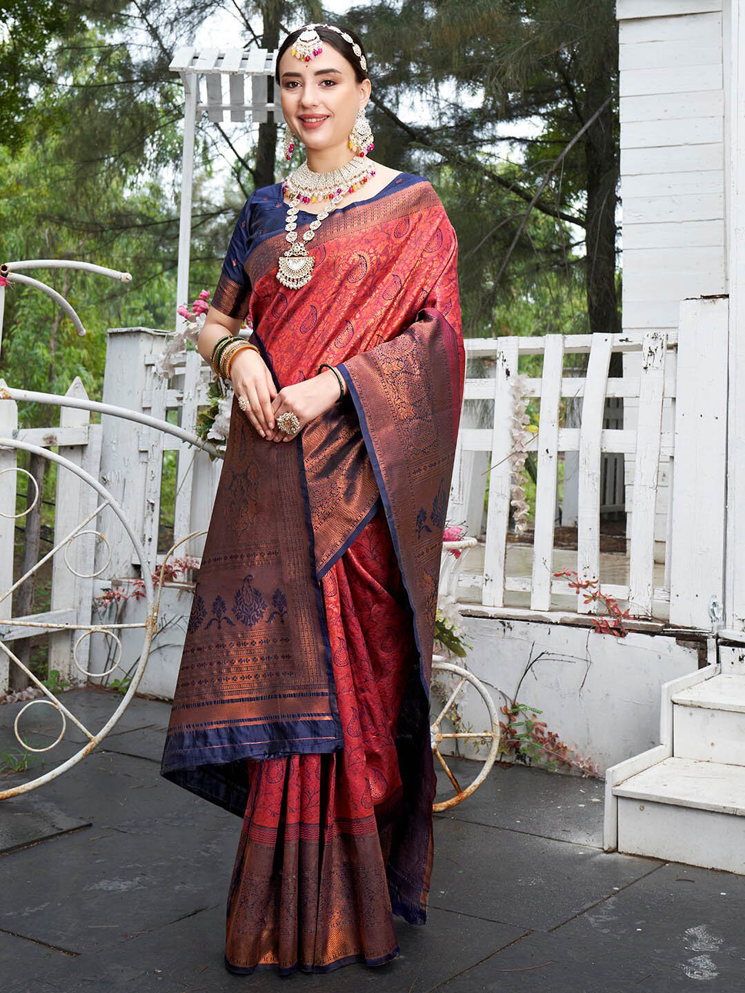 

Anouk Maroon & Purple Ethnic Motifs Woven Design Zari Art Silk Kanjeevaram Saree