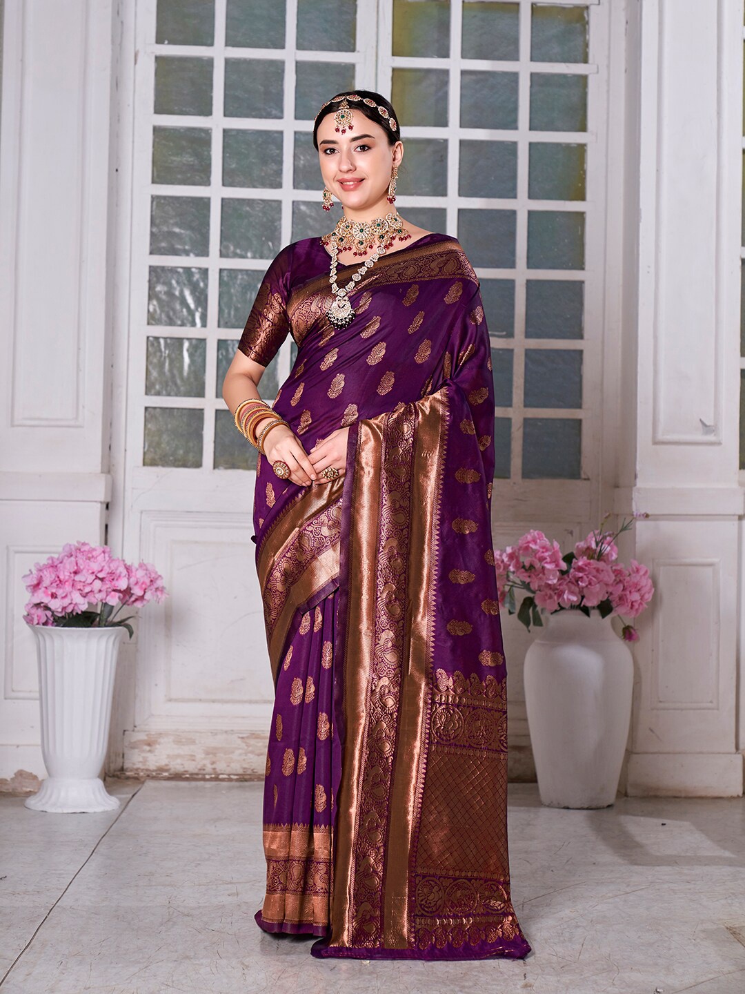 

Anouk Purple & Copper-Toned Ethnic Motifs Woven Design Zari Kanjeevaram Saree