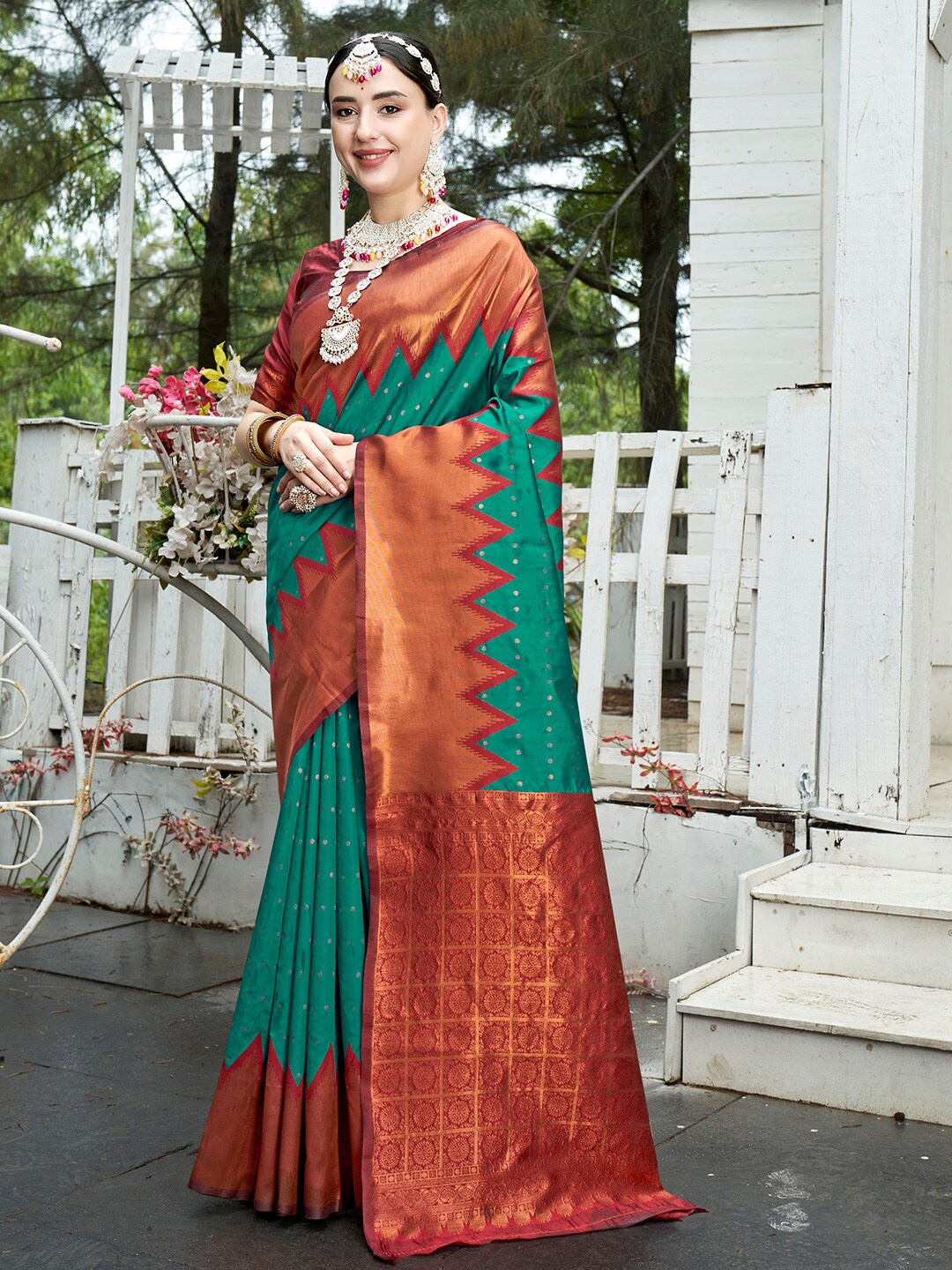 

Anouk Green & Red Ethnic Motifs Woven Design Zari Kanjeevaram Saree