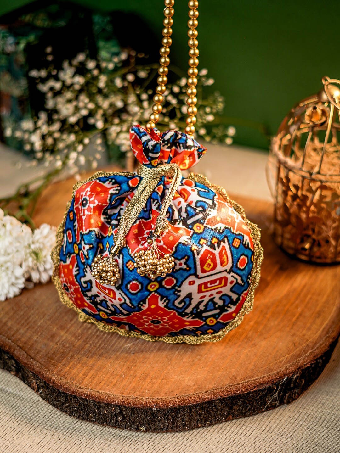 

Sangria Printed Potli Clutch, Blue