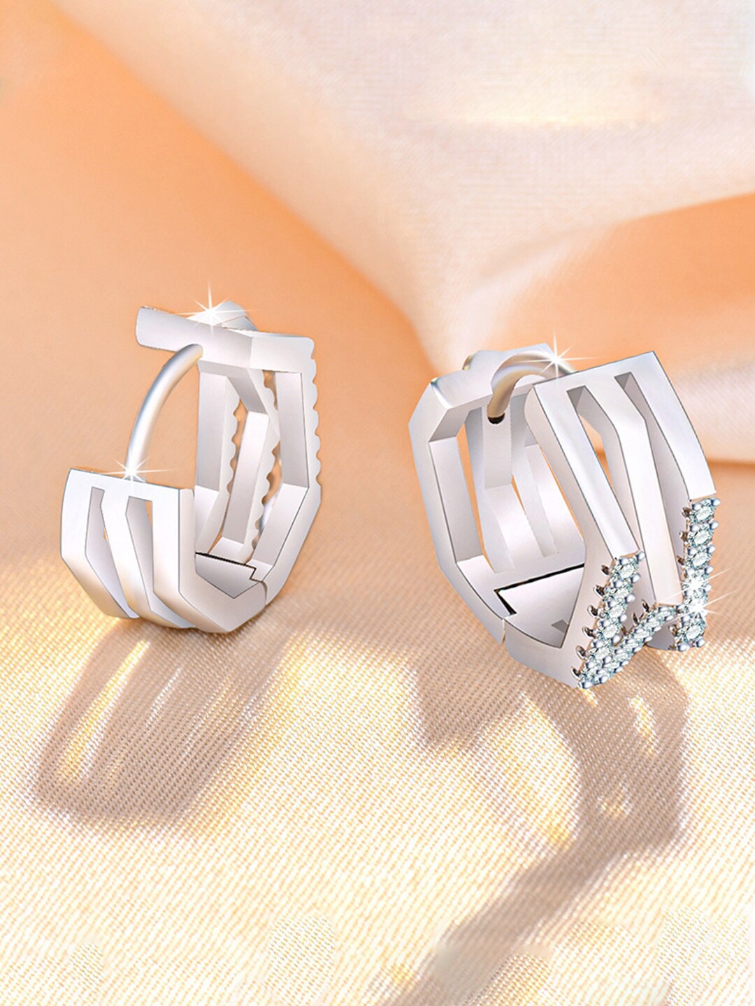 

Jewels Galaxy Silver Plated American Diamond Studded Studs Earrings