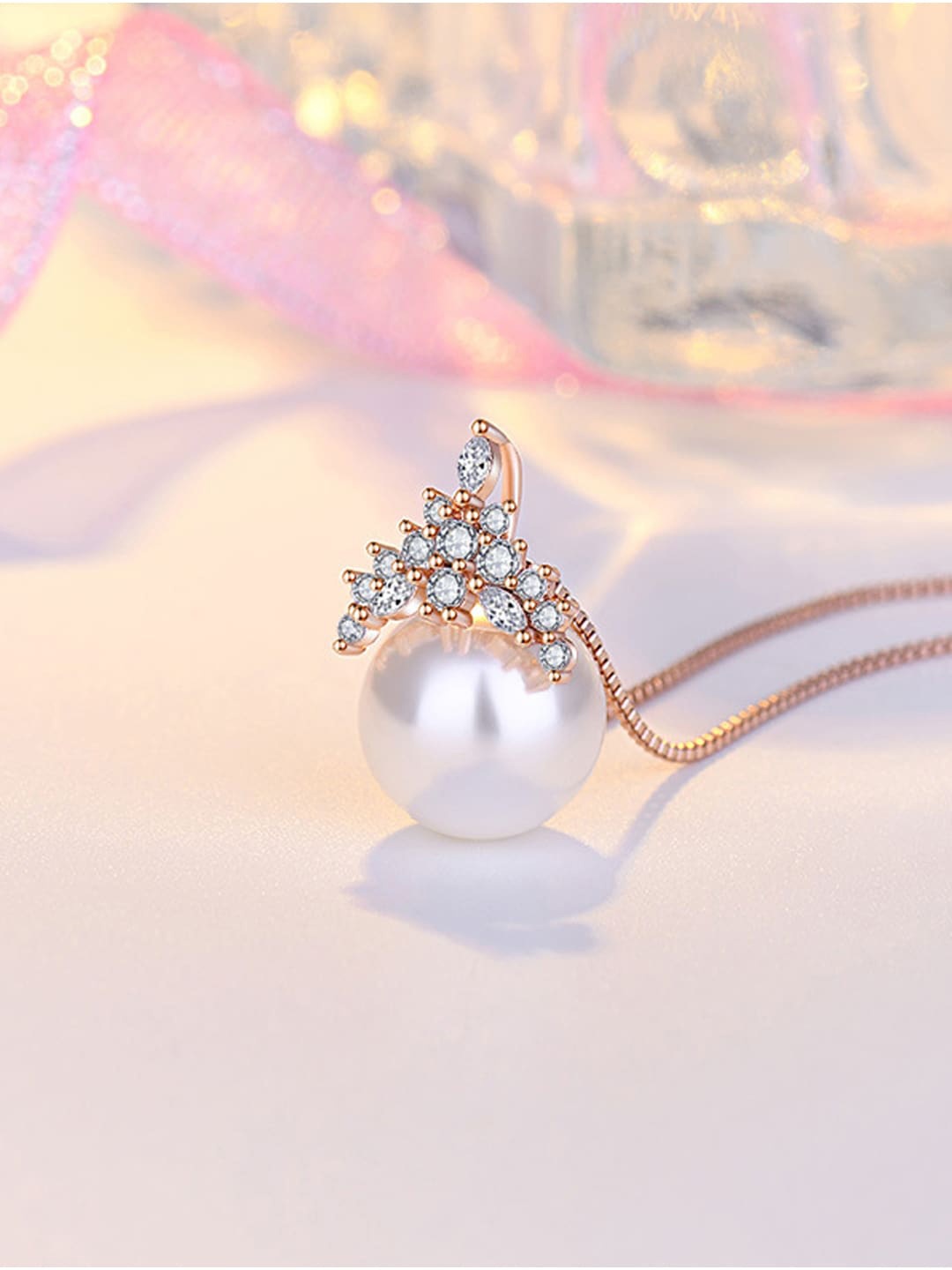 

Jewels Galaxy Rose Gold Plated AD & Pearls Studded Crown Like Pendant With Chain