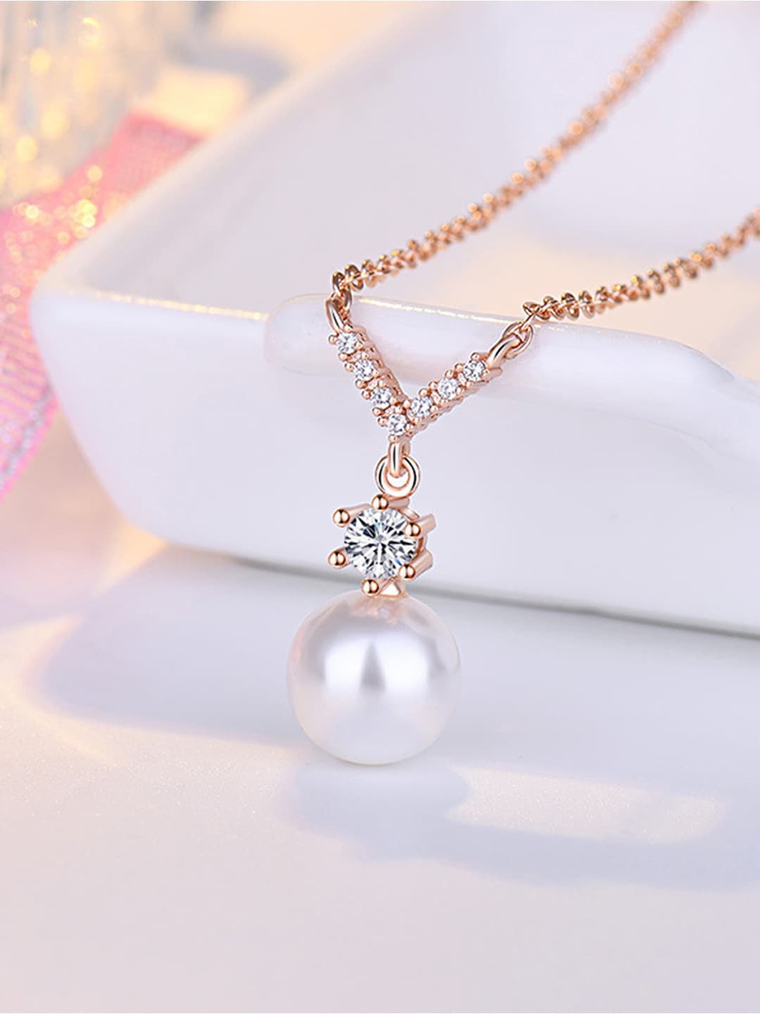 

Jewels Galaxy Rose Gold-Plated AD & Pearl-Studded Pendant With Chain