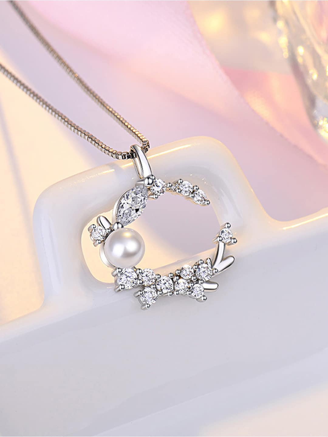 

Jewels Galaxy Silver-Plated AD-Studded Moon Shaped Pendant With Chain