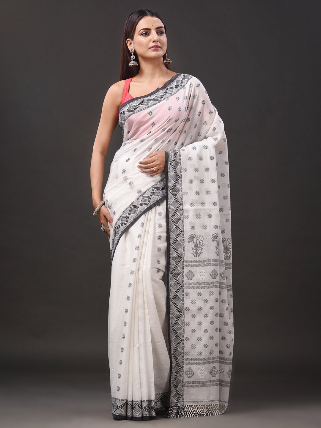 

Mitera White Ethnic Motifs Woven Design Pure Cotton Saree