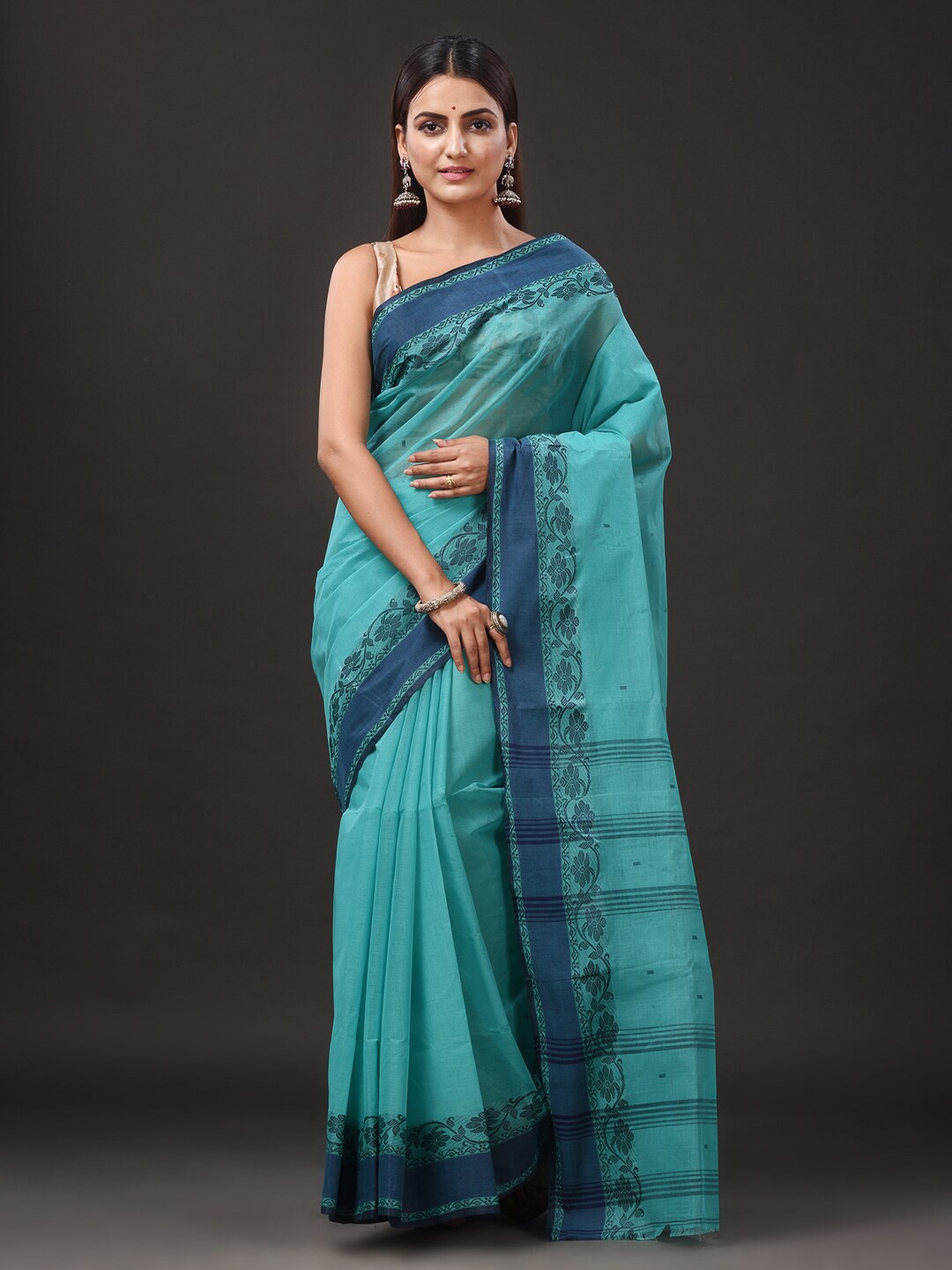 

Mitera Sea Green Geometric Woven Design Pure Cotton Taant Saree