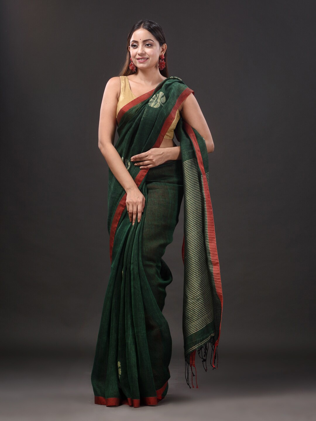 

Mitera Green Ethnic Motifs Woven Design Zari Pure Linen Saree