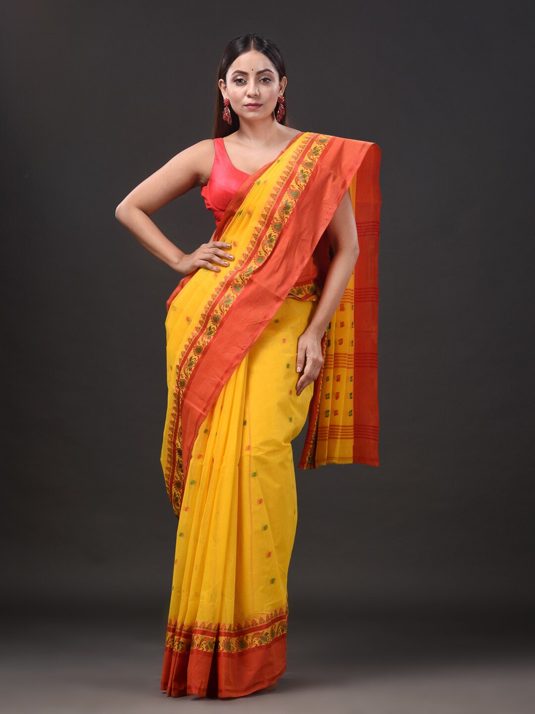 

Mitera Yellow & Red Ethnic Motifs Woven Design Pure Cotton Taant Saree