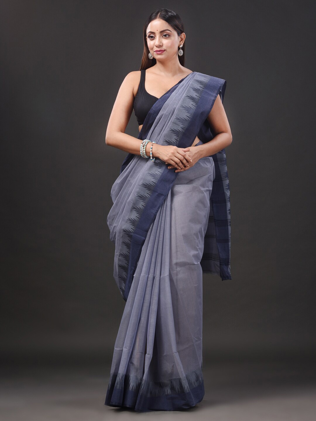 

Mitera Grey Woven Design Pure Cotton Taant Saree