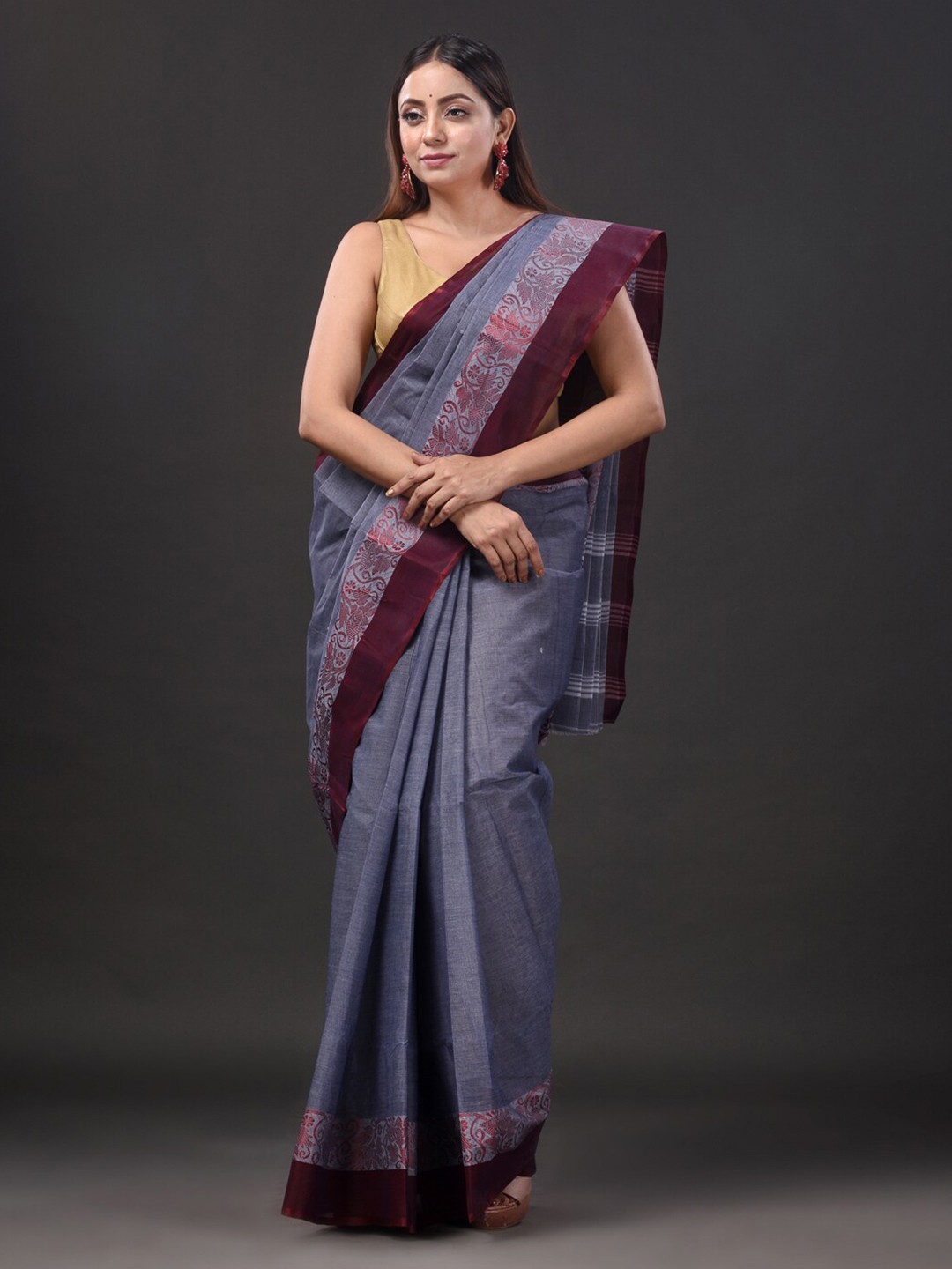 

Mitera Grey & Maroon Ethnic Motifs Woven Design Pure Cotton Taant Saree