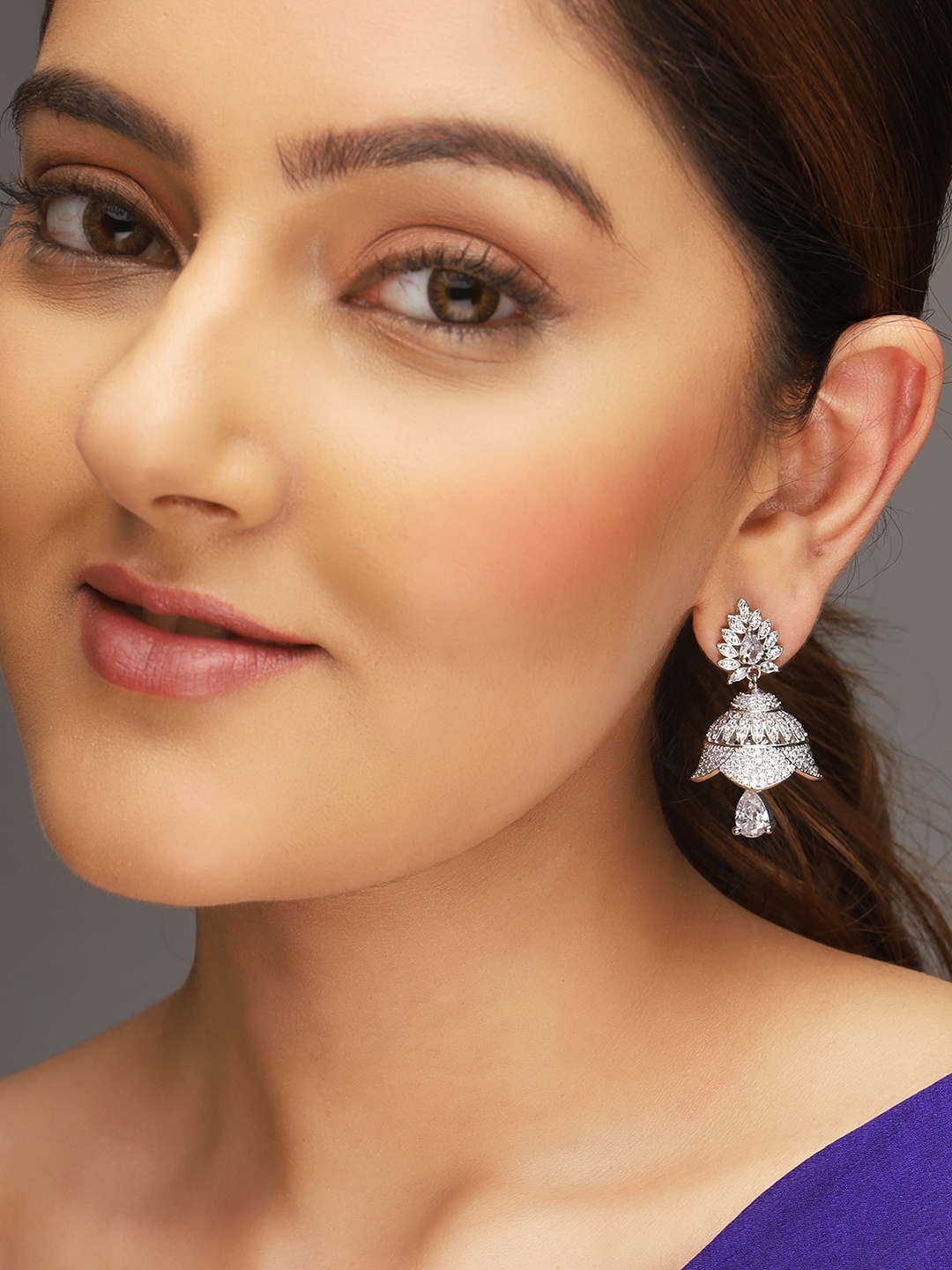 

AQUASTREET Silver-Plated AD Studded Crystal Teardrop Jhumkas Earrings