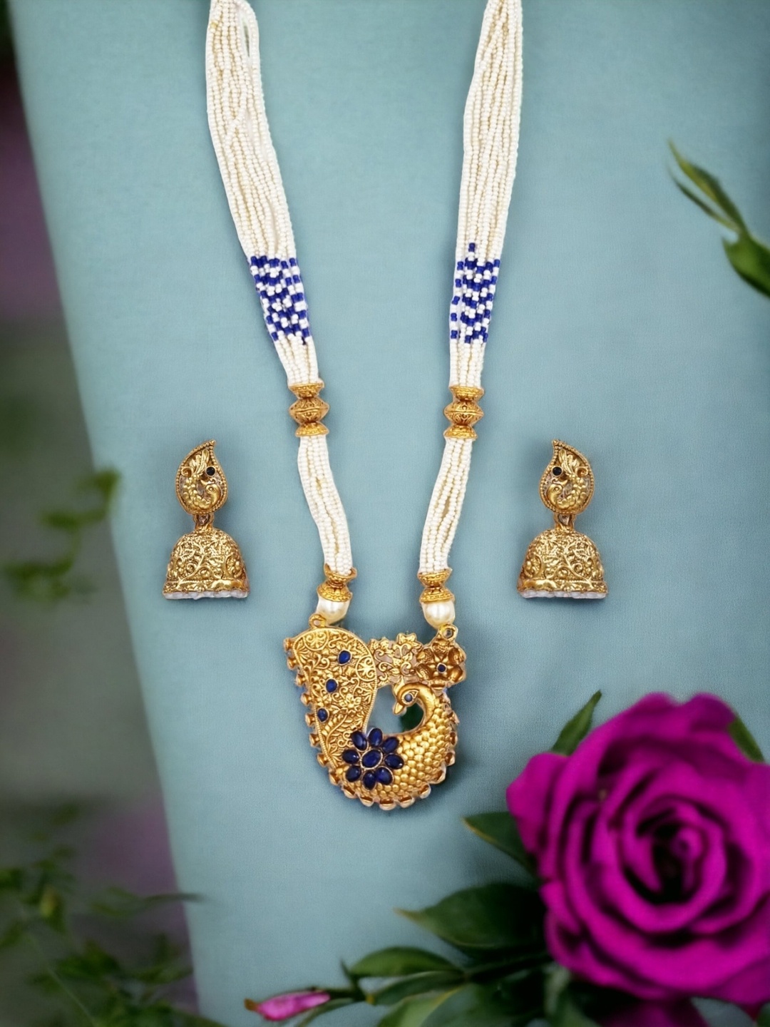 

Anouk Gold Plated Kundan Studded & Beaded Jewellery Set