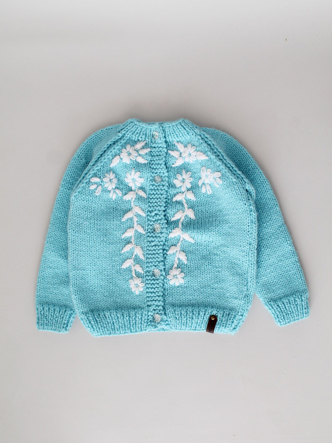 

Woonie Kids Floral Embroidered Turtle Neck Acrylic Cardigan, Blue