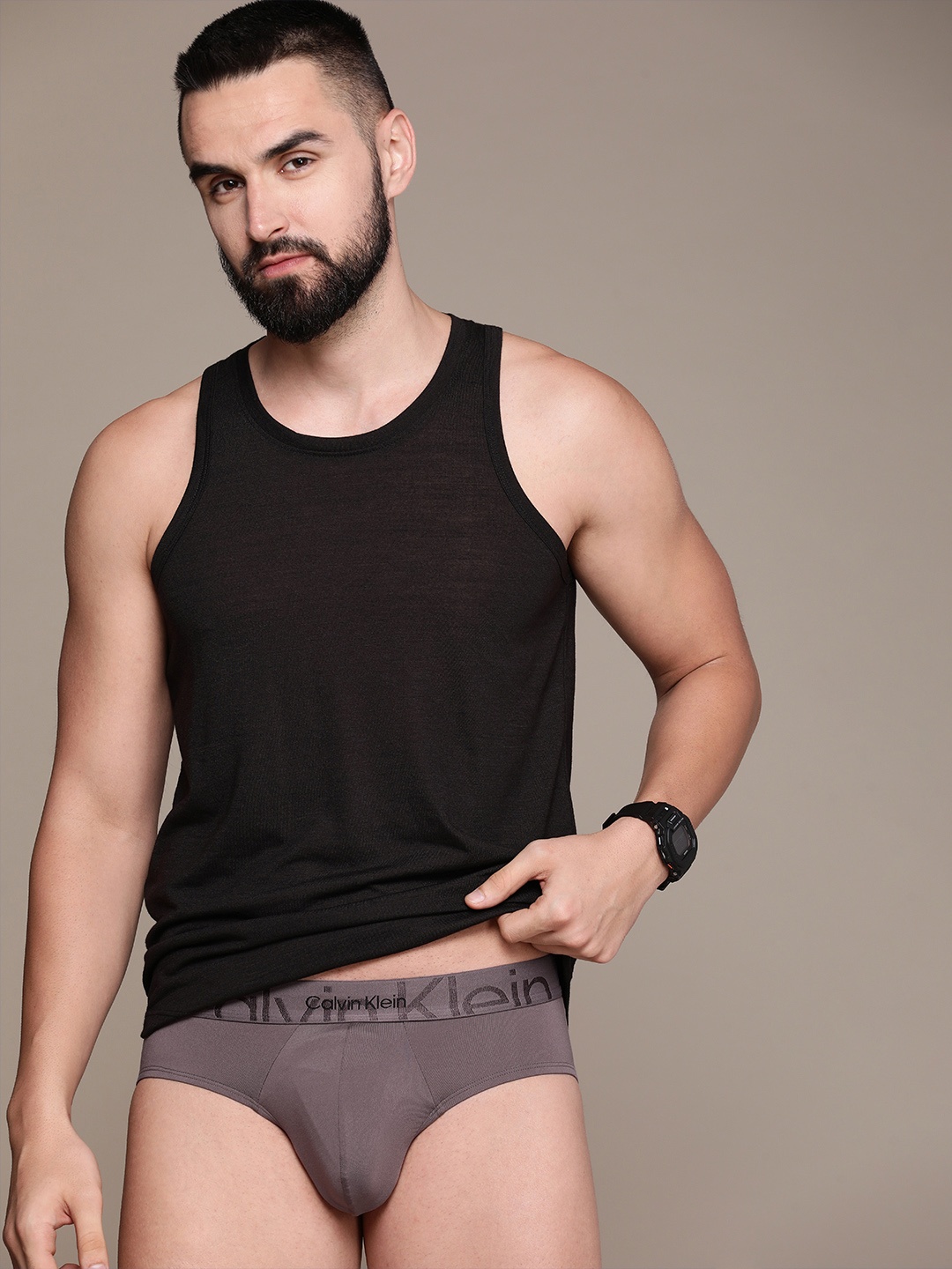 

Calvin Klein Underwear Men Mid-Rise Basic Brief NB3311PFK, Brown