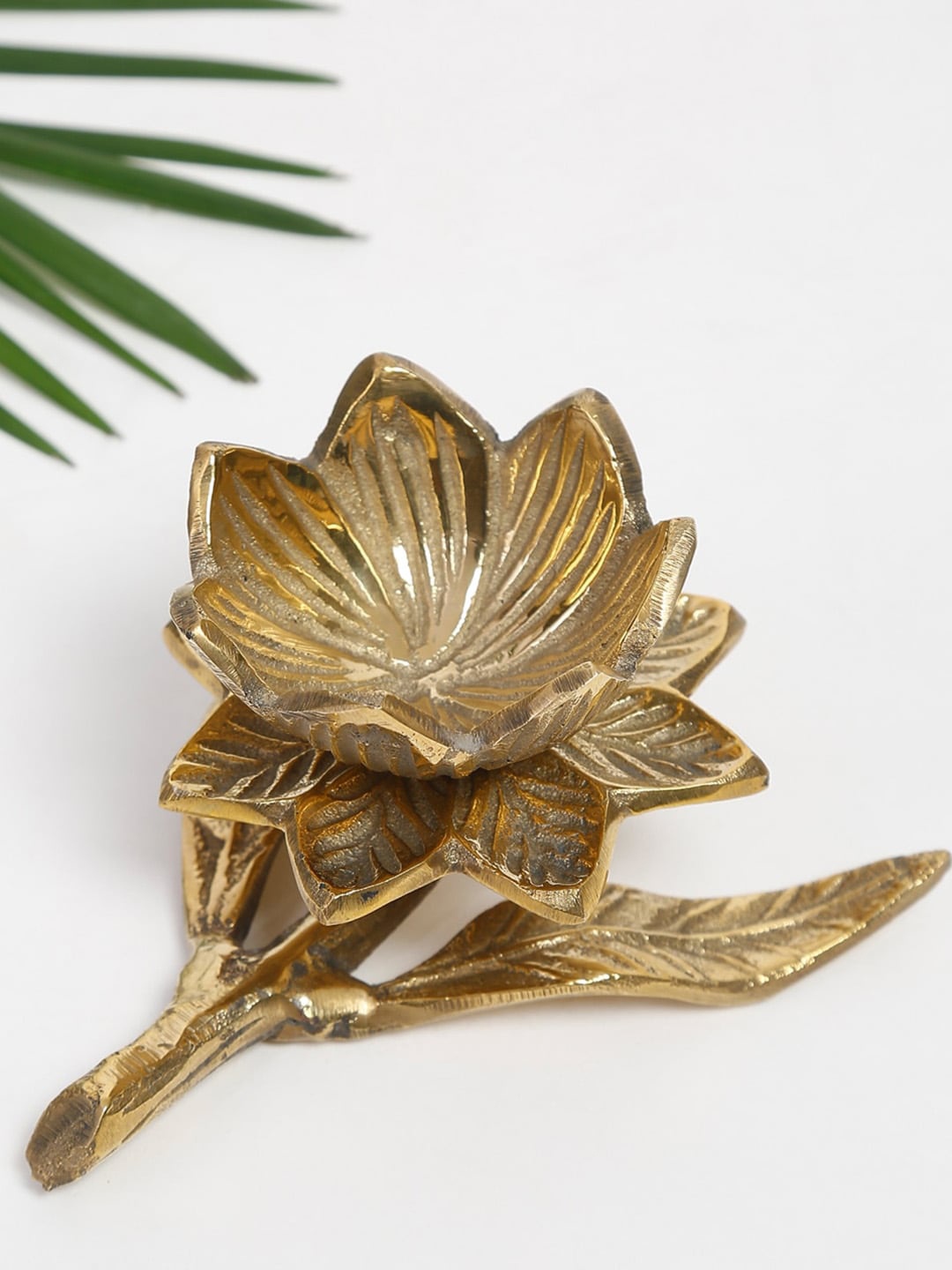 

Fabindia Gold Toned Textured Metal Candle Holder