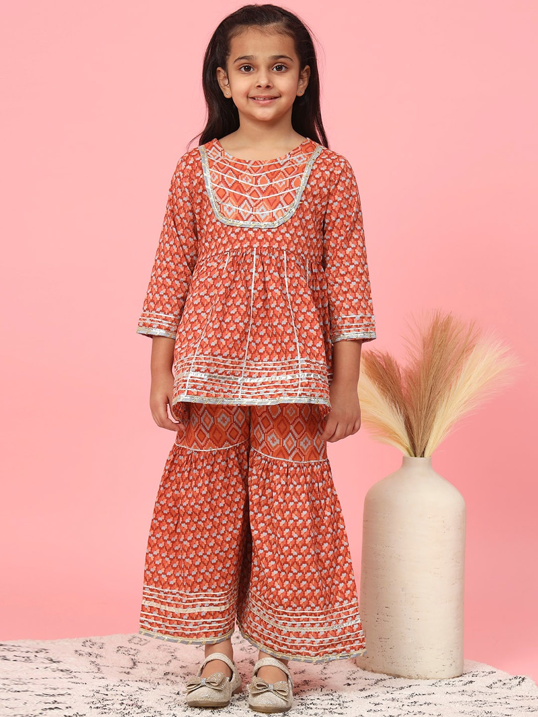 

Readiprint Fashions Girls Ethnic Motifs Printed Gotta Patti Pure Cotton Kurti with Sharara, Rust