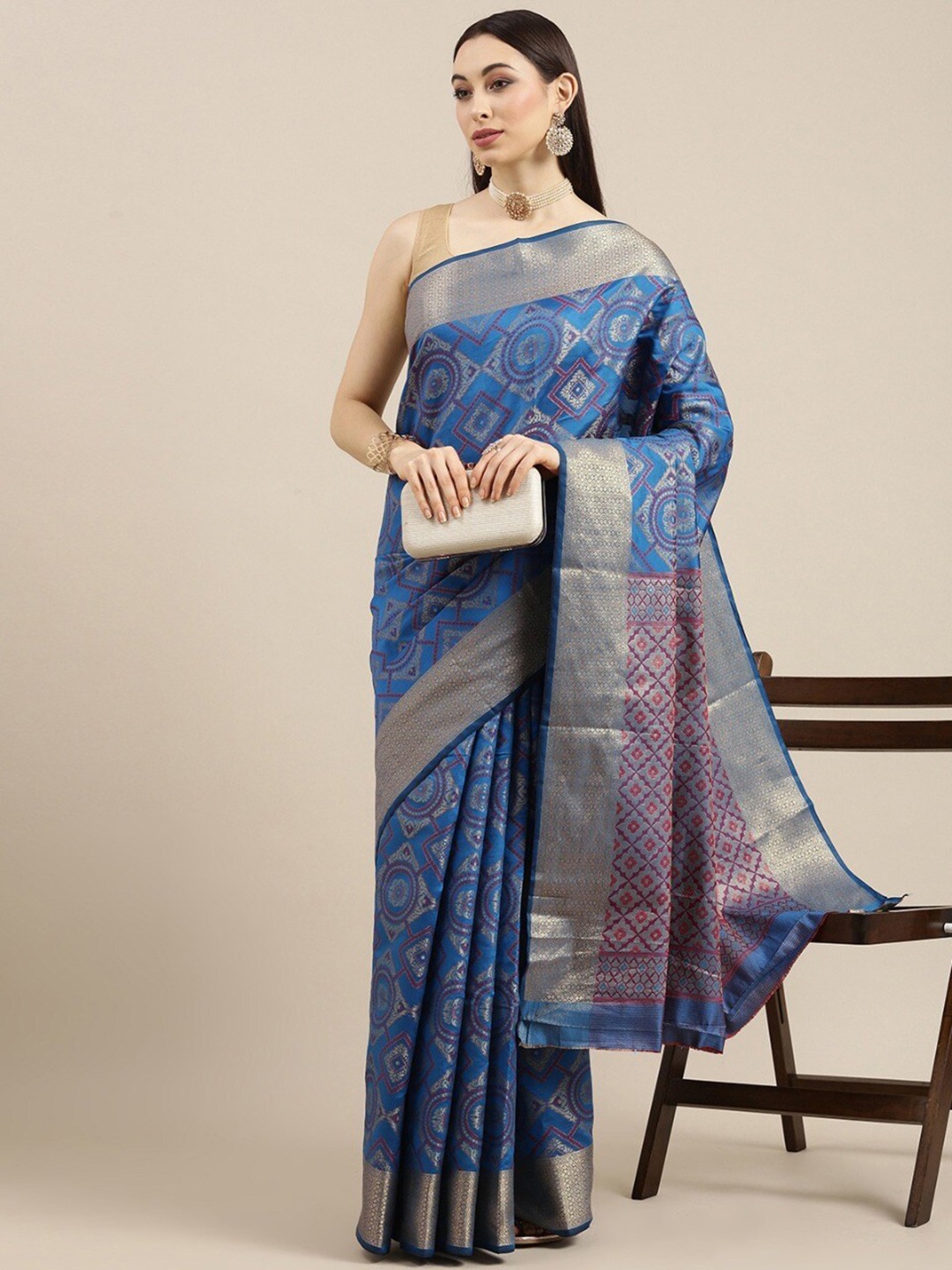 

Mitera Blue & Red Ethnic Motifs Woven Design Zari Silk Blend Kanjeevaram Saree