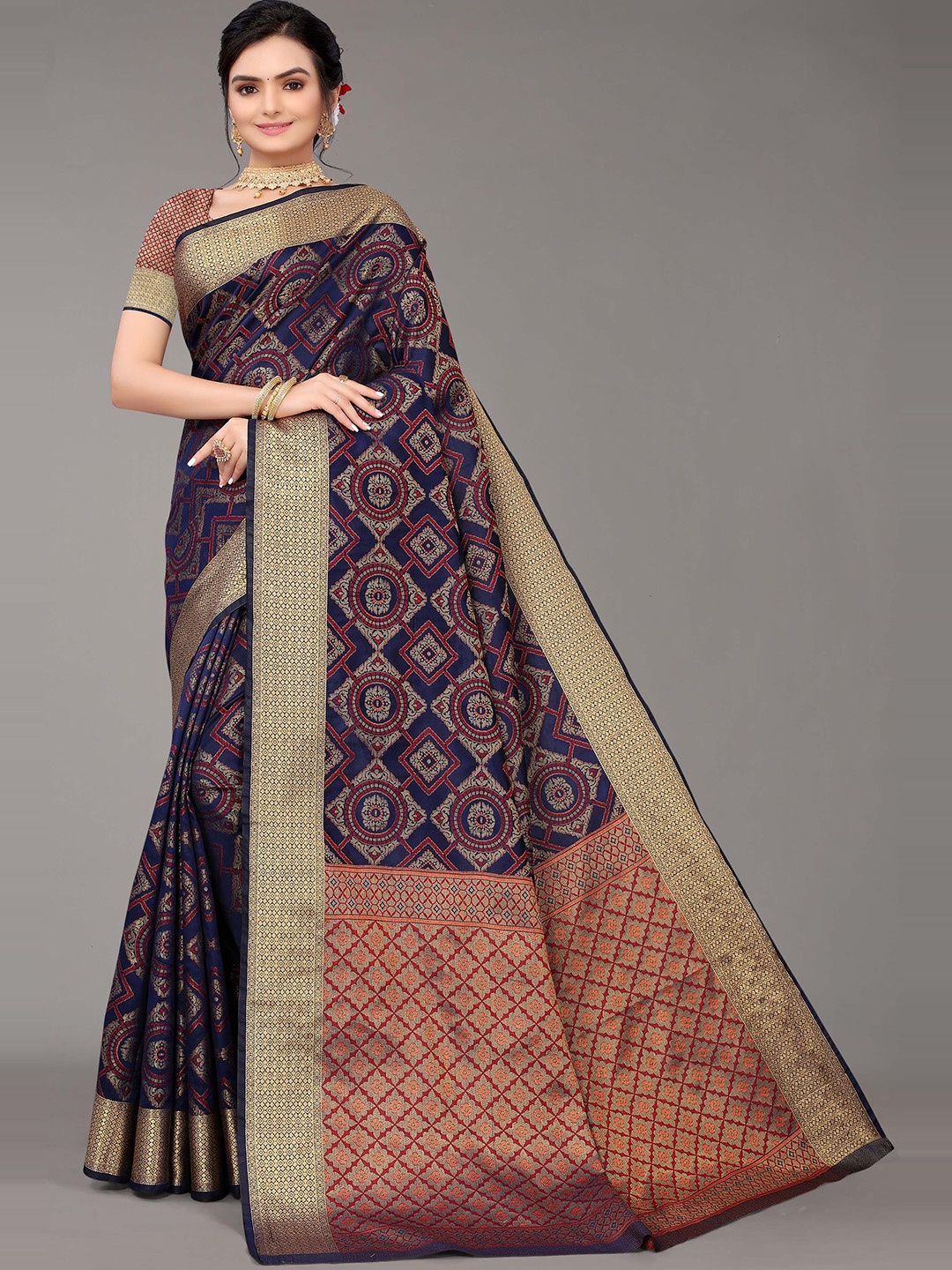 

Mitera Navy Blue & Red Motifs Woven Design Zari Silk Blend Kanjeevaram Saree
