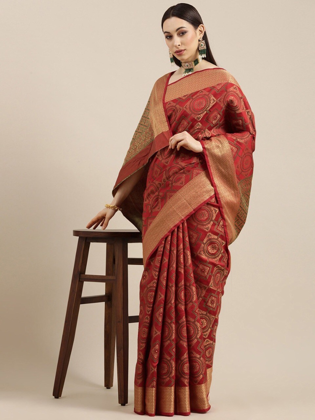 

Mitera Maroon & Green Motifs Woven Design Zari Silk Blend Kanjeevaram Saree