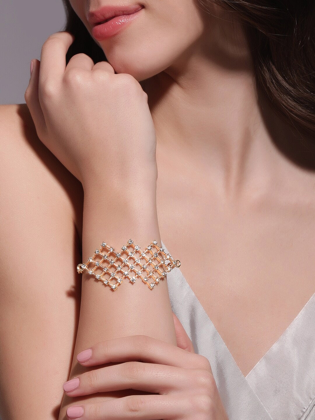 

Rubans Voguish Gold-Plated Cubic Zirconia Studded Wraparound Bracelet