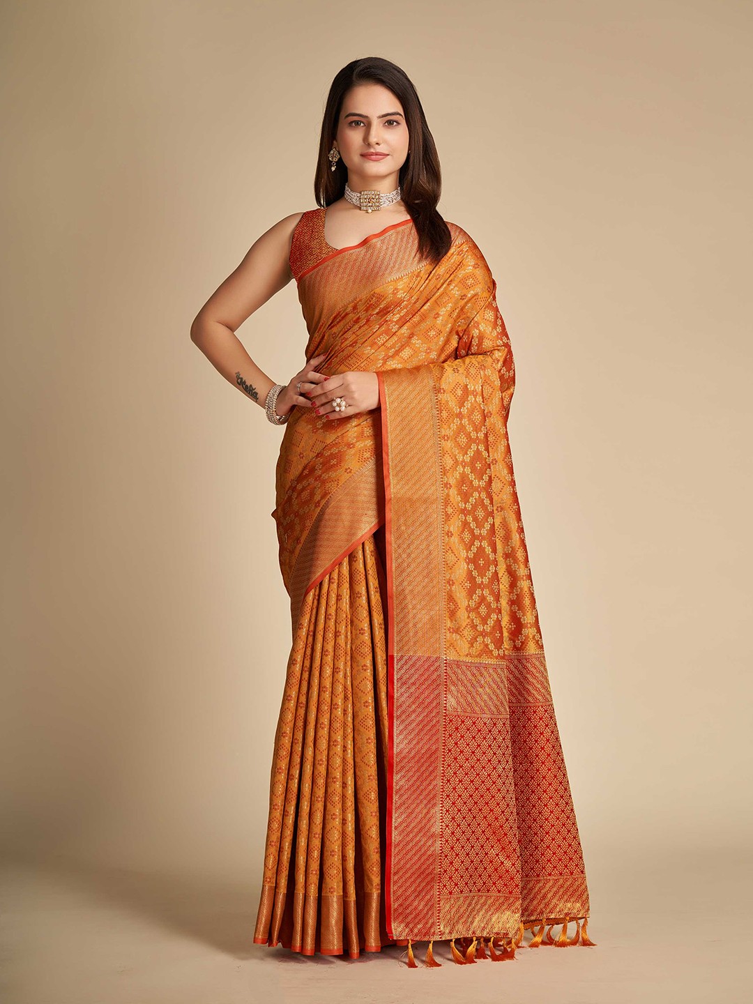 

Mitera Orange & Gold-Toned Ethnic Motifs Woven Design Zari Patola Saree