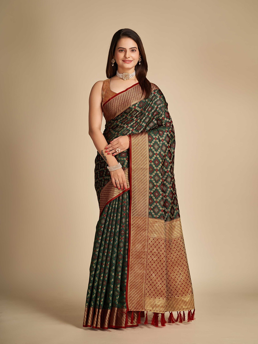 

Mitera Green & Gold-Toned Ethnic Motifs Woven Design Zari Patola Saree