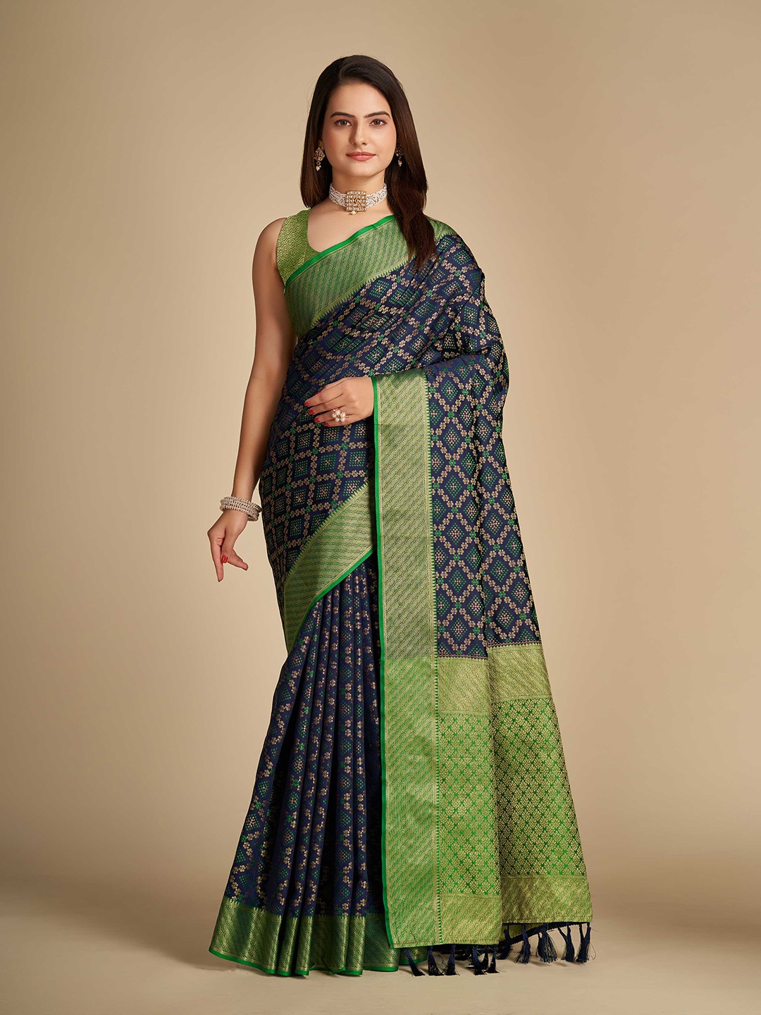 

Mitera Navy Blue & Green Ethnic Motifs Woven Design Zari Silk Blend Patola Saree