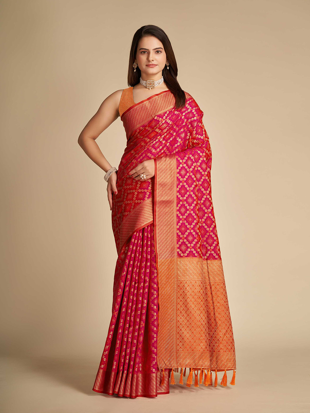 

Mitera Pink & Orange Ethnic Motifs Woven Design Zari Silk Blend Patola Saree