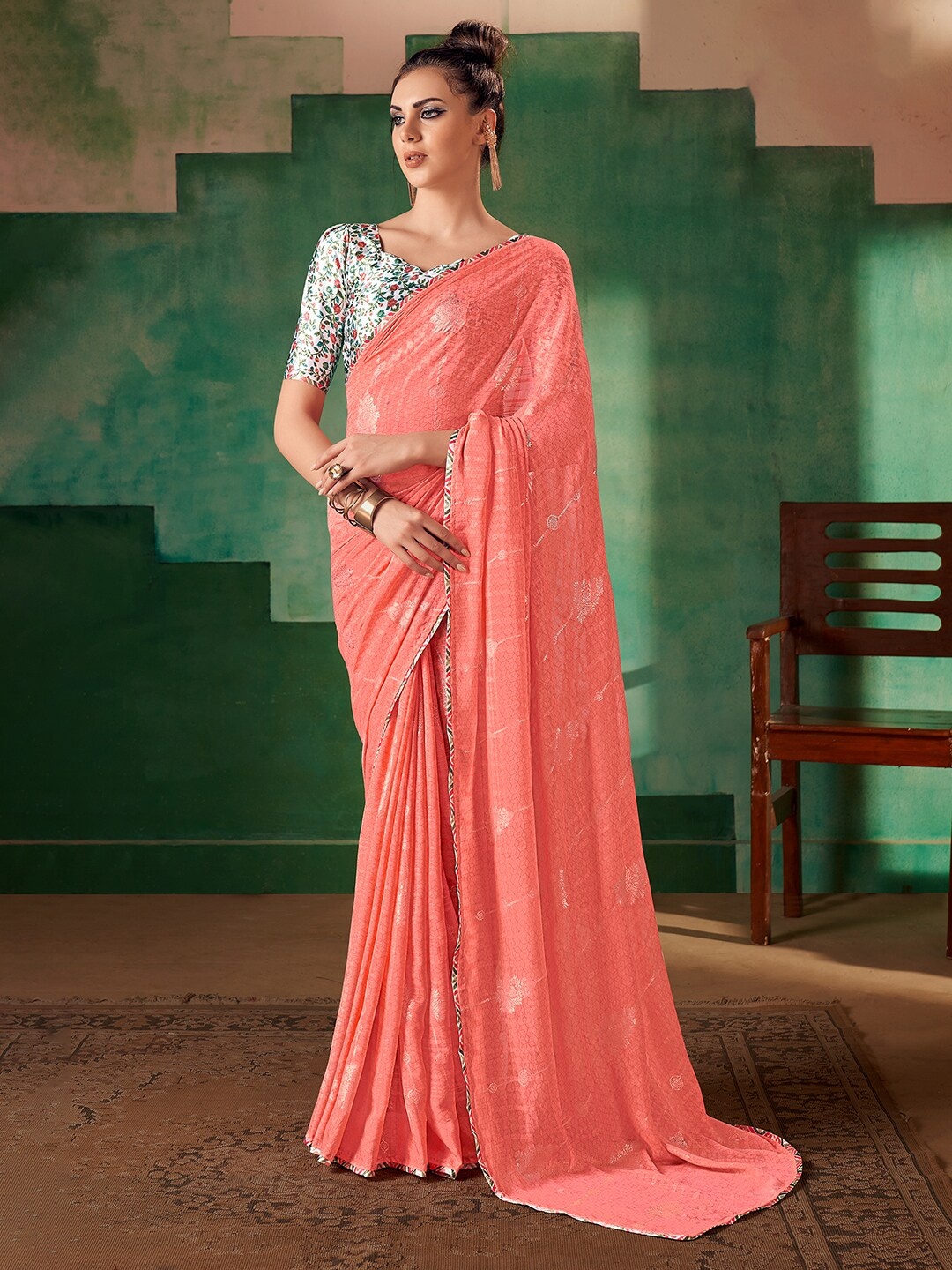 

Saree mall Pink Ethnic Motifs Printed Poly Georgette Sarees