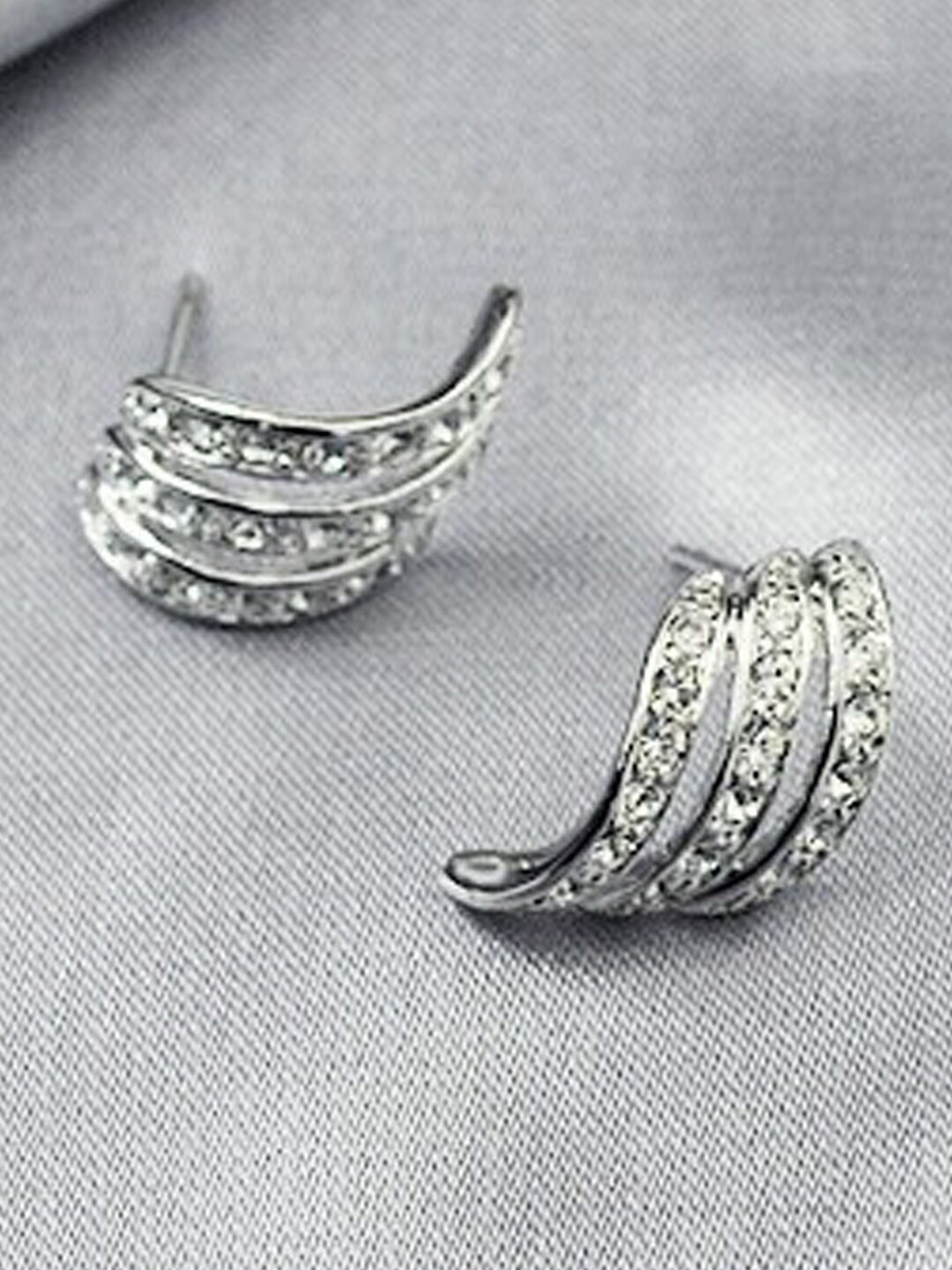 

Jewels Galaxy Silver-Plated Contemporary American Diamond Studded Studs Earrings