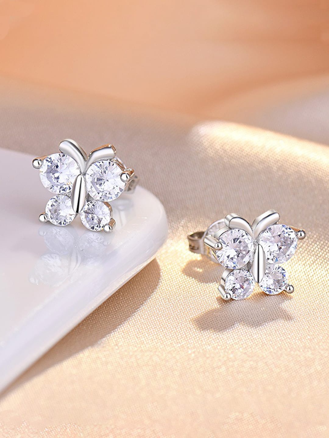 

Jewels Galaxy Silver-Plated Contemporary Stud Earrings