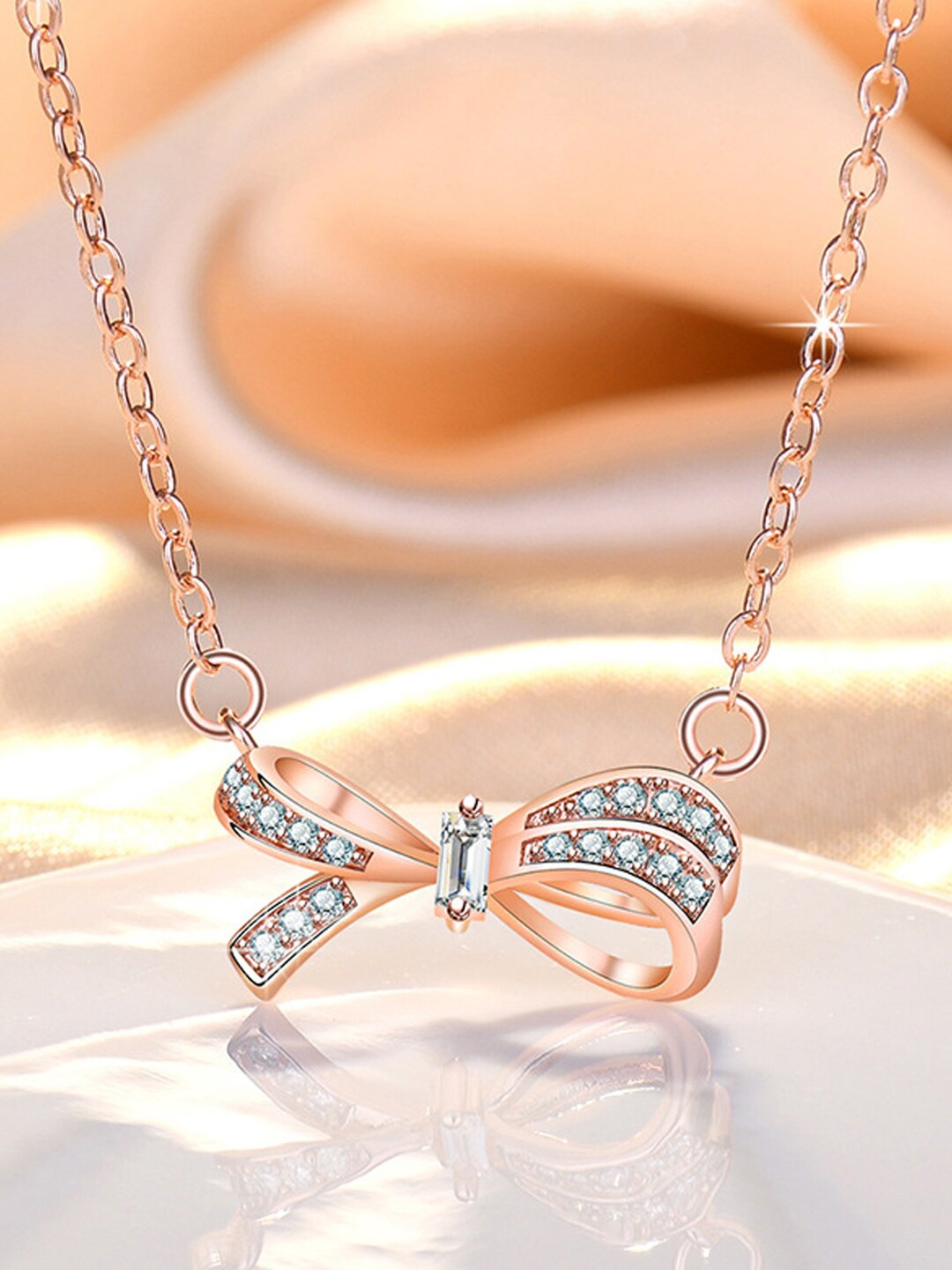 

Jewels Galaxy Rose Gold-Plated American Diamond Studded Bow Design Necklace