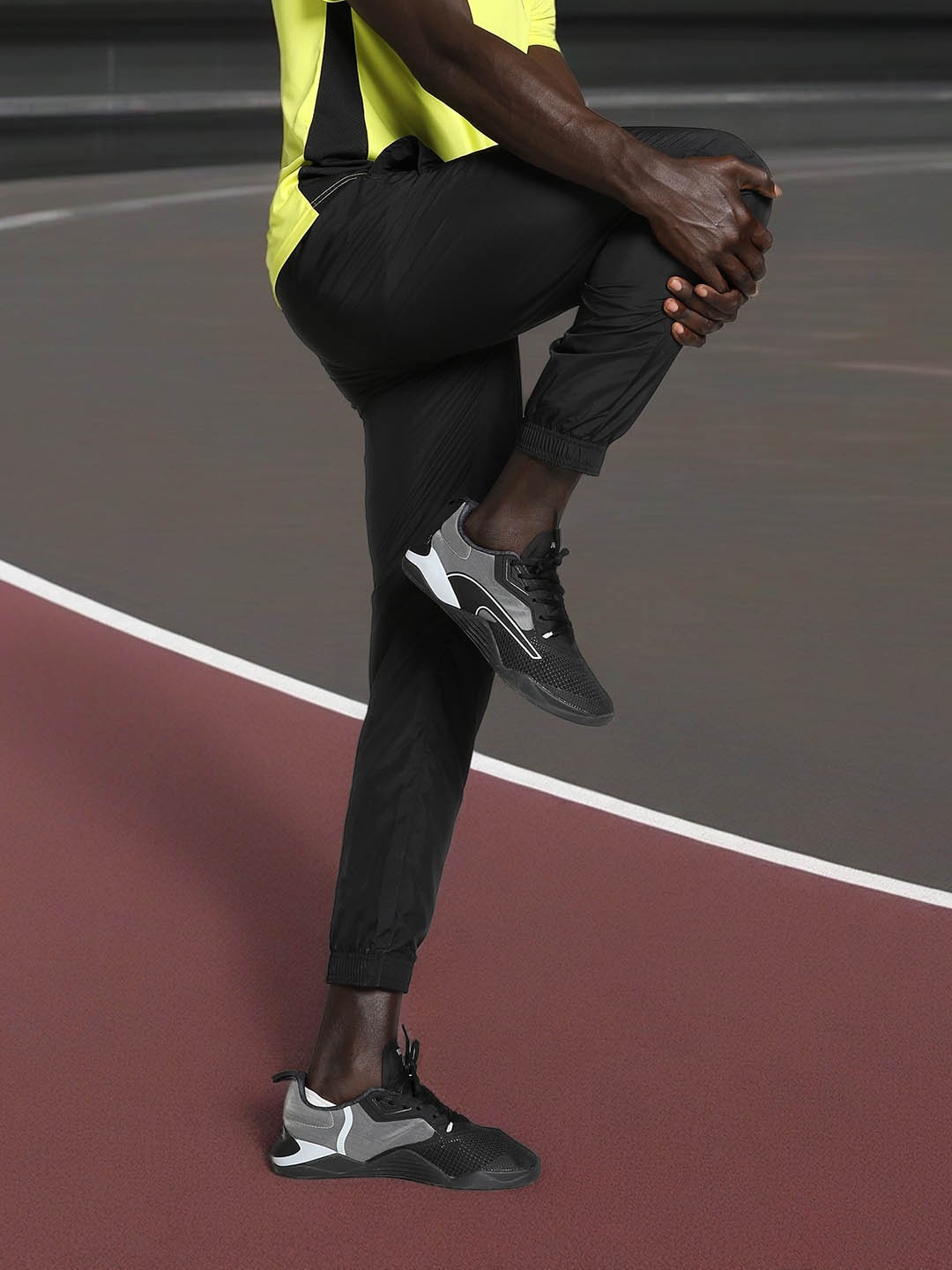 

Puma Men Brand Logo Printed ACTIVE Woven Joggers, Black